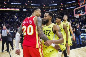 Utah Jazz guard Mike Conley (11) congratulates Atlanta Hawks forward/center John Collins (20) on their win at Vivint Arena. Mandatory Credit: Christopher Creveling-USA TODAY Sports