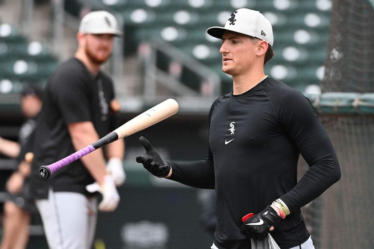 MLB Pipeline’s No. 1 White Sox prospect Colson Montgomery flips his bat during MLB Spring Training batting practice.