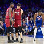Miami Heat star Jimmy Butler speaks to teammate during Play-In game after sustaining knee injury