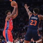 New York Knicks center Mitchell Robinson and Philadelphia 76ers center Joel Embiid, limited by injury