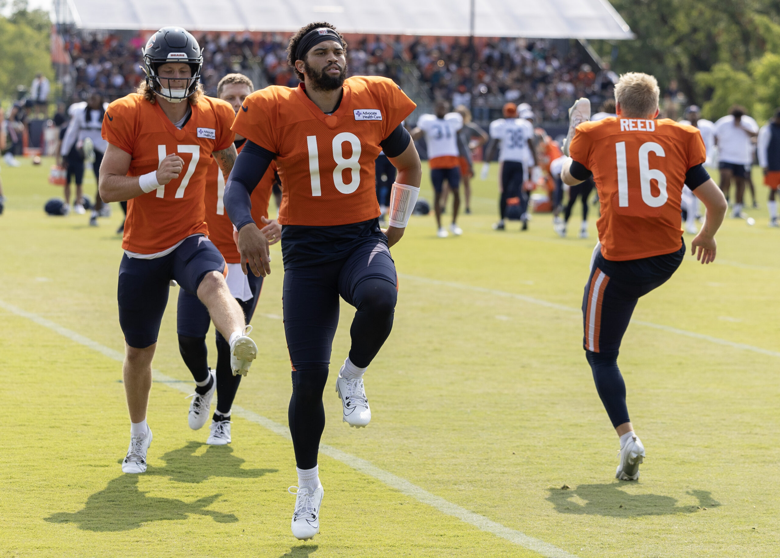 Bears quarterbacks Caleb Williams (18), Tyson Bagent (17), Brett Rypien...