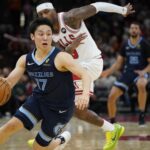 Oct 12, 2024; Chicago, Illinois, USA; Memphis Grizzlies guard Yuki Kawamura (17) dribbles the ball against the Chicago Bulls during the second half at United Center. Mandatory Credit: David Banks-Imagn Images