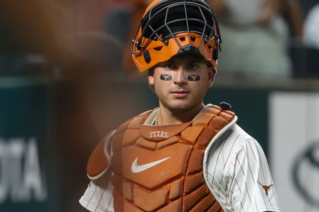 Texas catcher Rylan Galvan (6) looks over to the oppoents’ dugout during the 2024 Phillips 66 Big 12 Baseball Championship game between Texas and Texas Tech on May 21, 2024, at Globe Life Field in Arlington, TX.