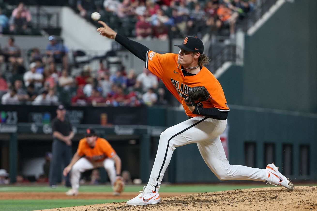 Oklahoma State pitcher Gabe Davis (22) pitches the ball during the 2024 Phillips 66 Big 12 Baseball Championship game between Oklahoma and Oklahoma State on May 25, 2024, at Globe Life Field in Arlington, TX.