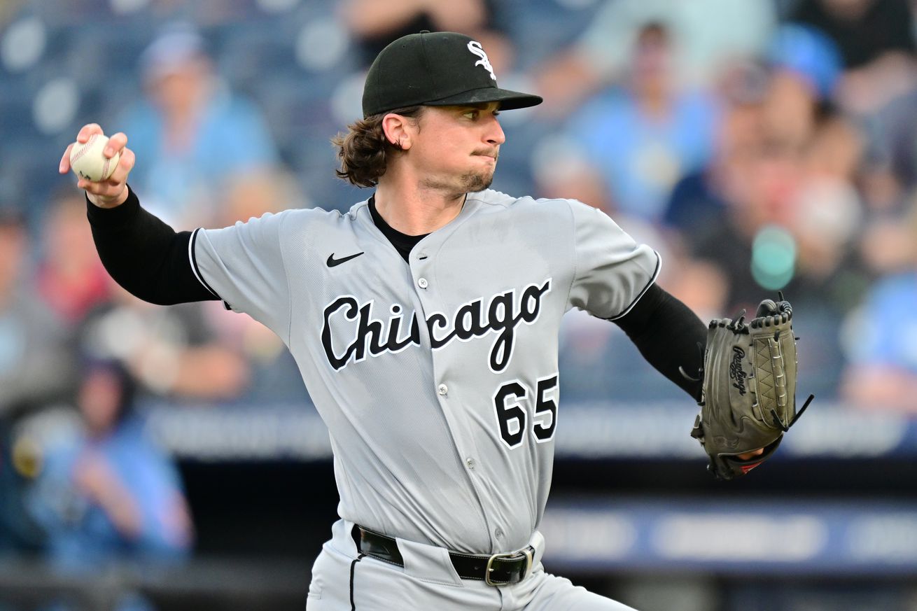 Davis Martin #65 of the Chicago White Sox delivers a pitch in the first inning against the Tampa Bay Rays at George M. Steinbrenner Field on July 22, 2025 in Tampa, Florida.