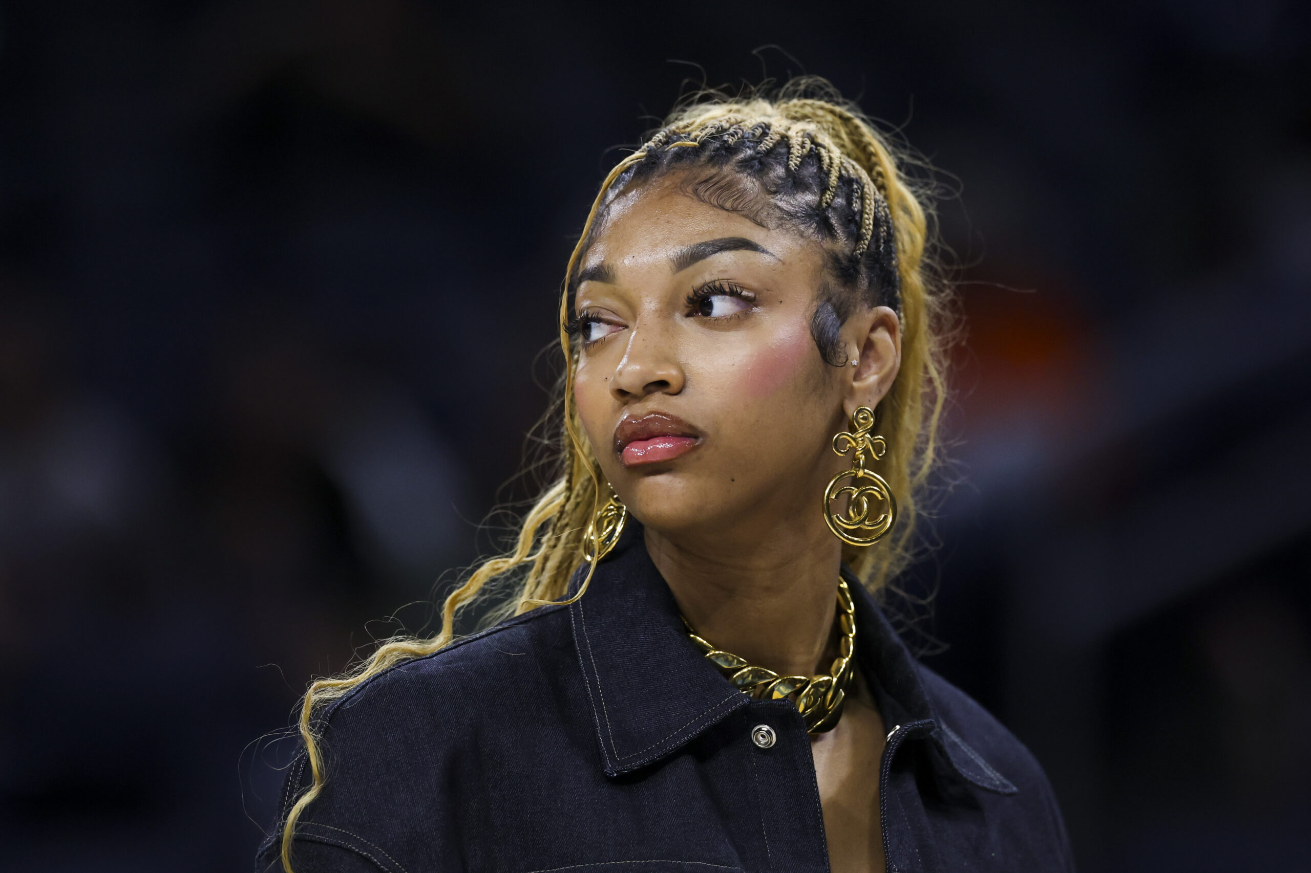Chicago Sky forward Angel Reese stands on the court before...