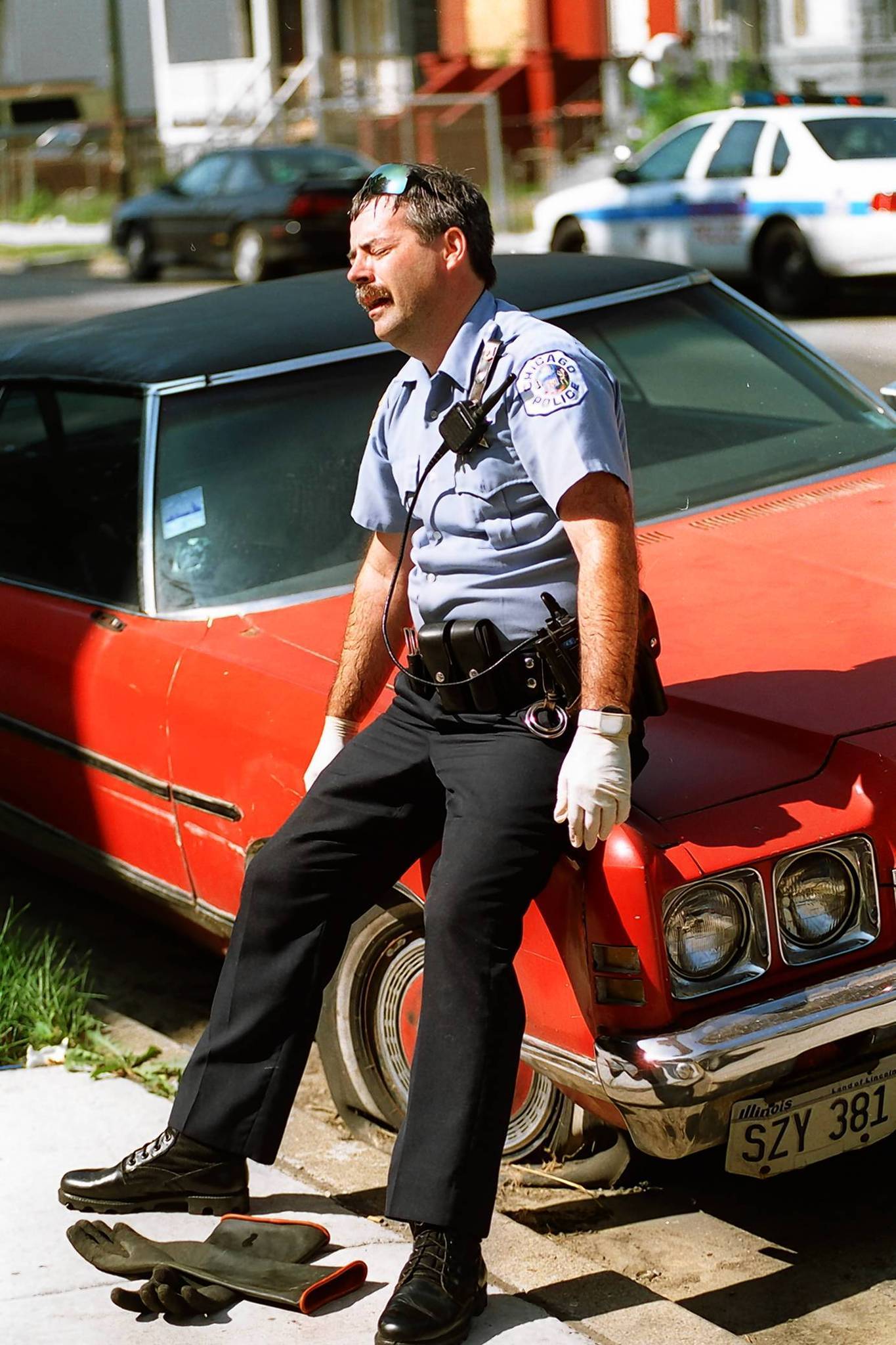 Chicago police Officer Charley Henson, of the Englewood District, is shaken...