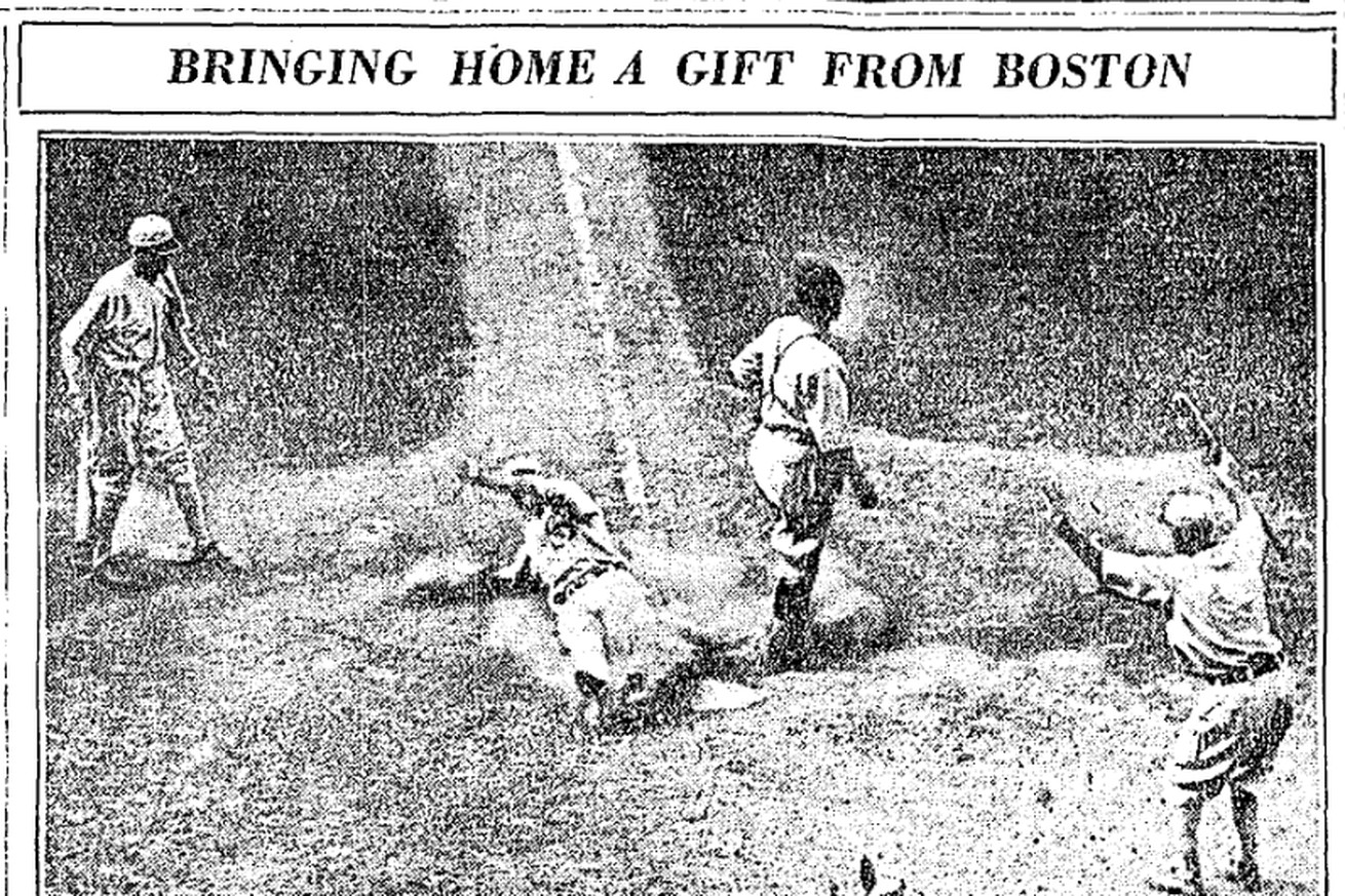 Original Chicago Tribune caption reads: “Bill Barrett started to steal second with two out in the ninth inning of the Red Sox-White Sox game yesterday and by the time the Cardigans had finished throwing the ball around Bill was sliding in with the winning run.