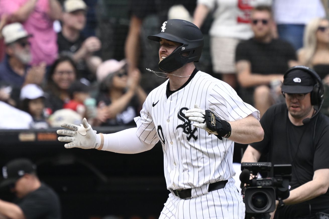 Chicago White Sox first baseman Tim Elko (30) claps after he hit a two run home run during the second inning against the Kansas City Royals at Rate Field.