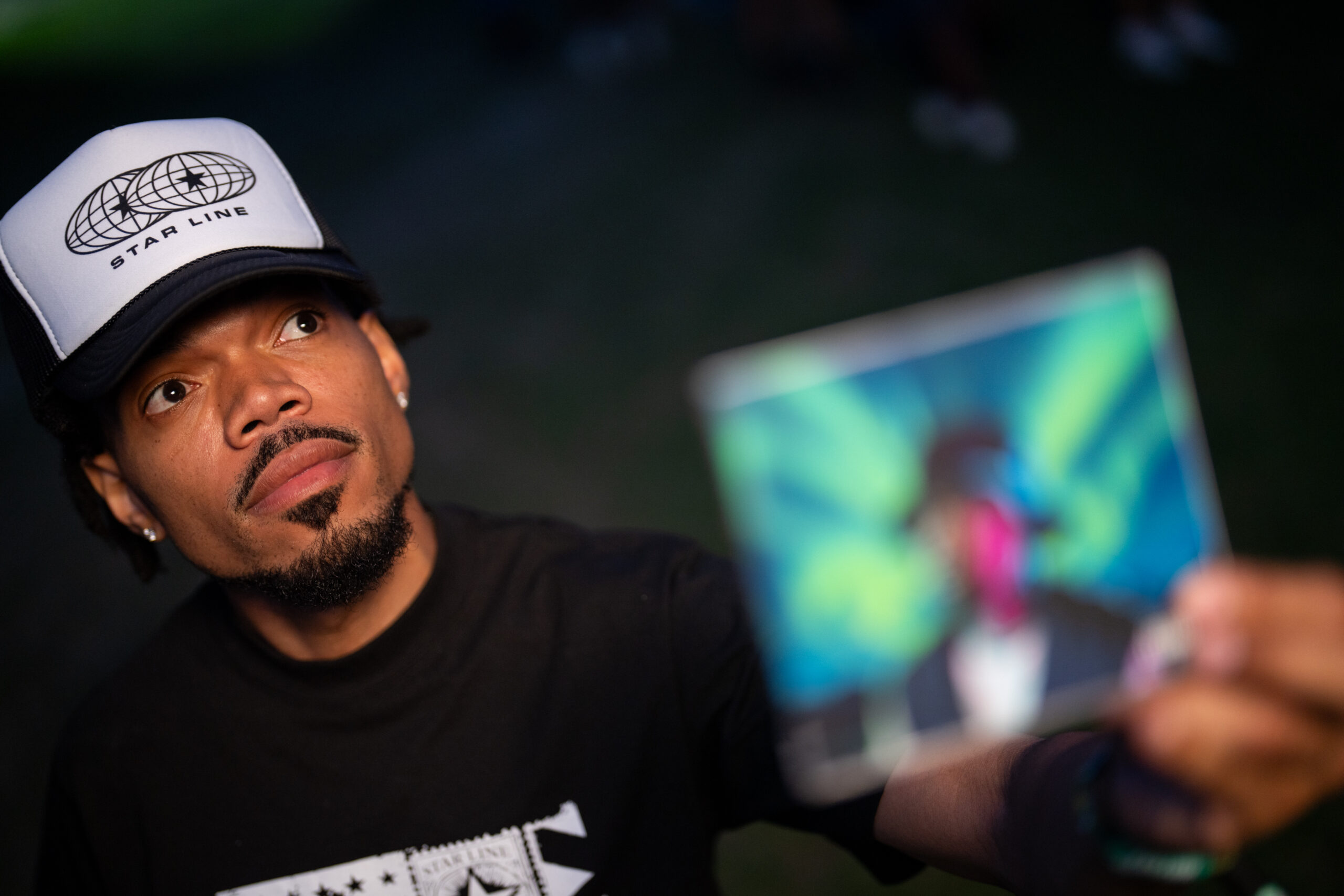 Chance the Rapper holds his new album, Starline, after performing...