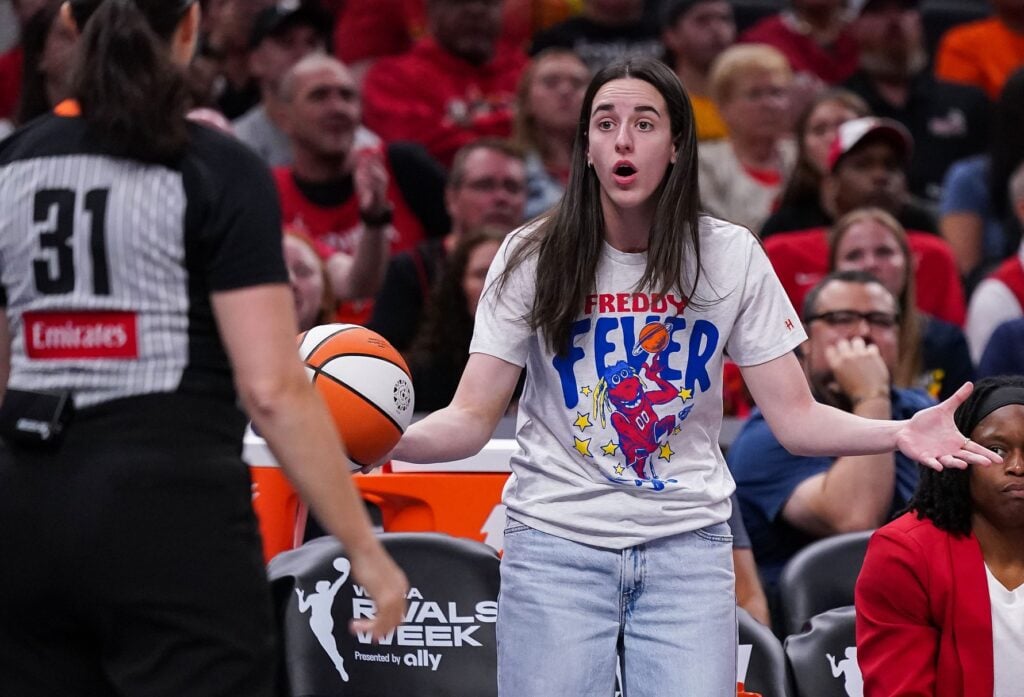 Indiana Fever guard Caitlin Clark (22) reacts to a call from the referee Tuesday, Aug. 12, 2025, during the game at Gainbridge Fieldhouse in Indianapolis. The Dallas Wings defeated the Indiana Fever, 81-80. © Grace Hollars/IndyStar / USA TODAY NETWORK via Imagn Images