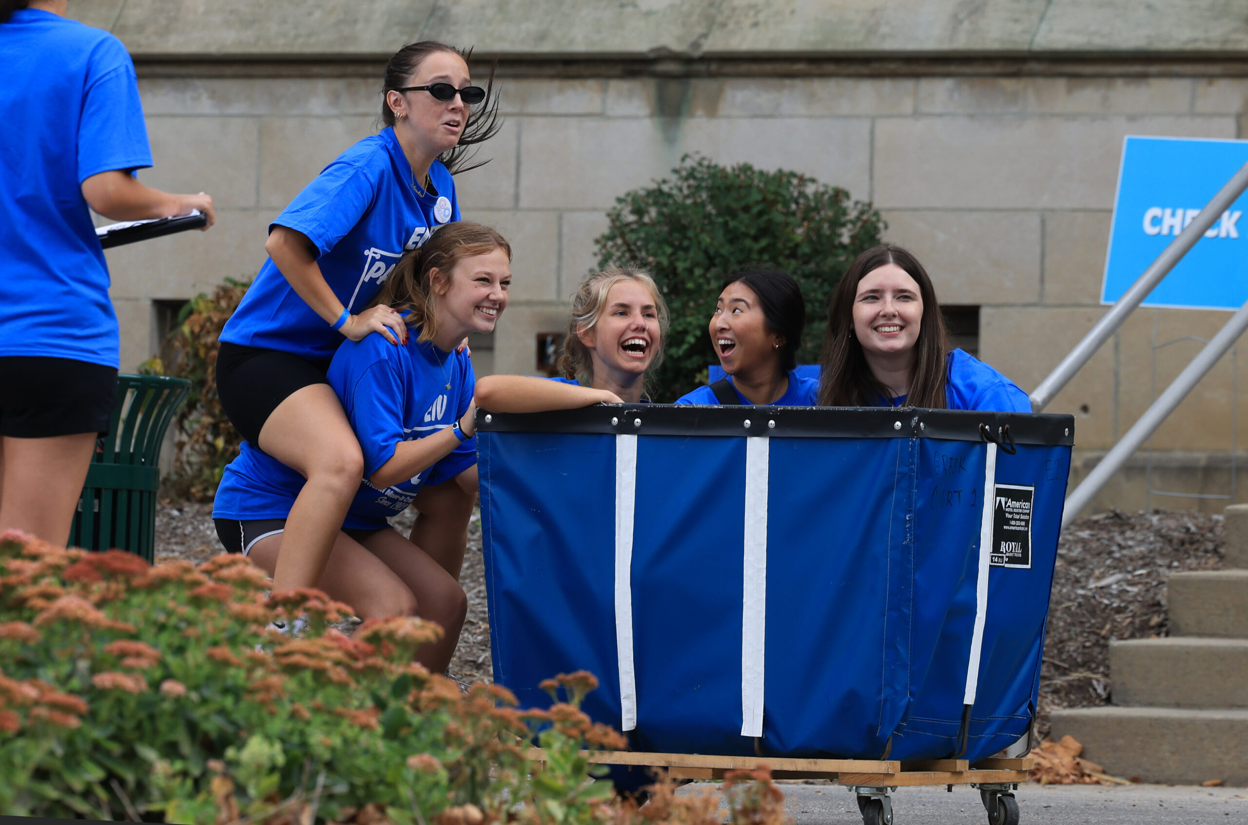 Eastern Illinois University students take pictures in a move-in bin...