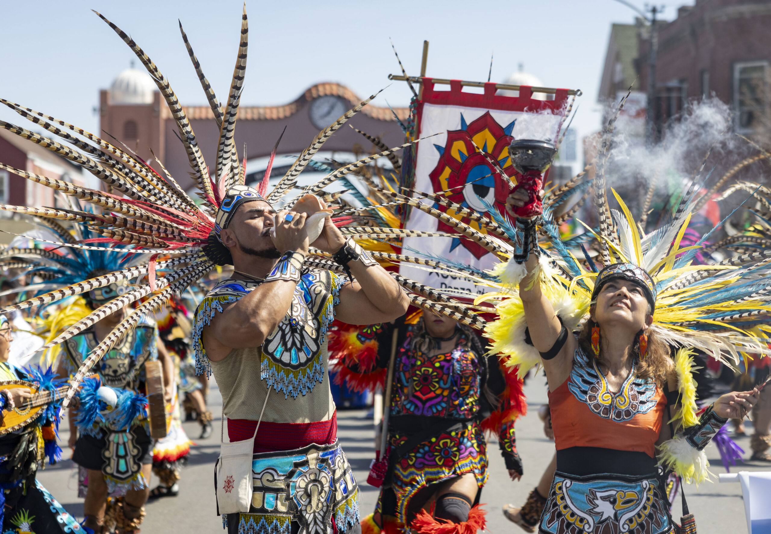 Aztec dancers lead the annual 26th Street Mexican Independence Day...
