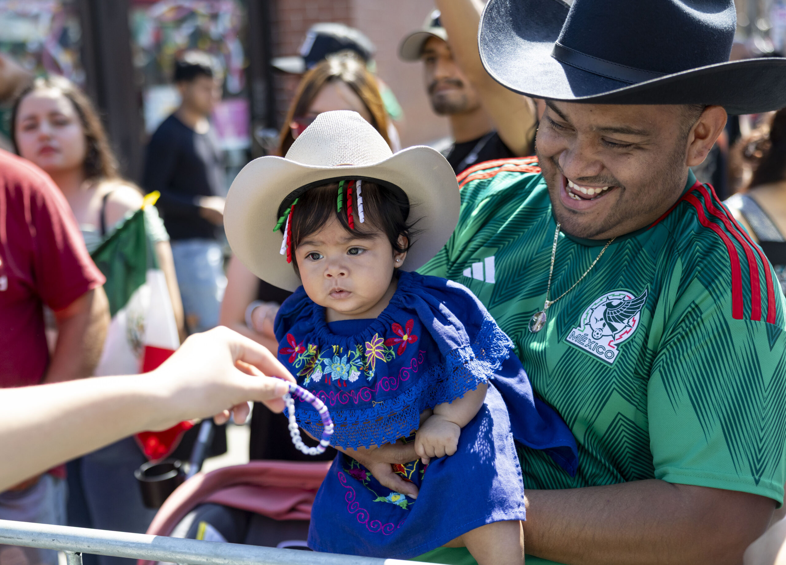 Óscar Gómez and his 5-month-old daughter, Ailini Celeste Gómez, get...