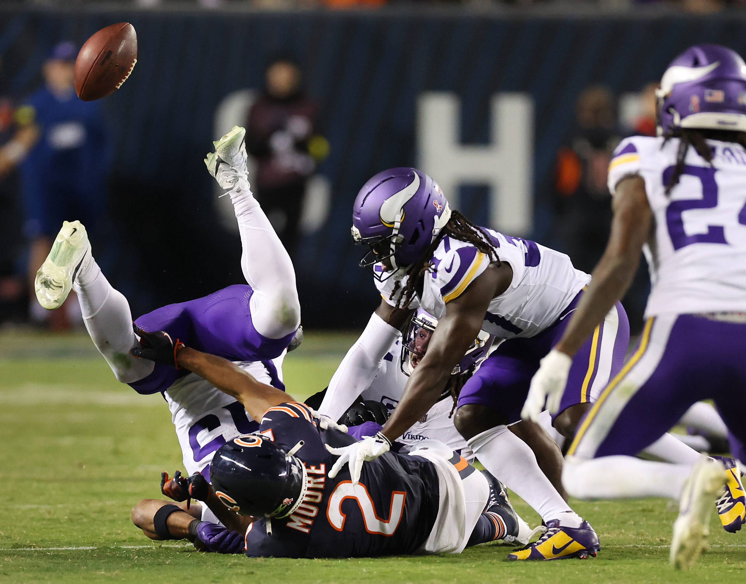 Chicago Bears wide receiver DJ Moore (2) laterals the ball...