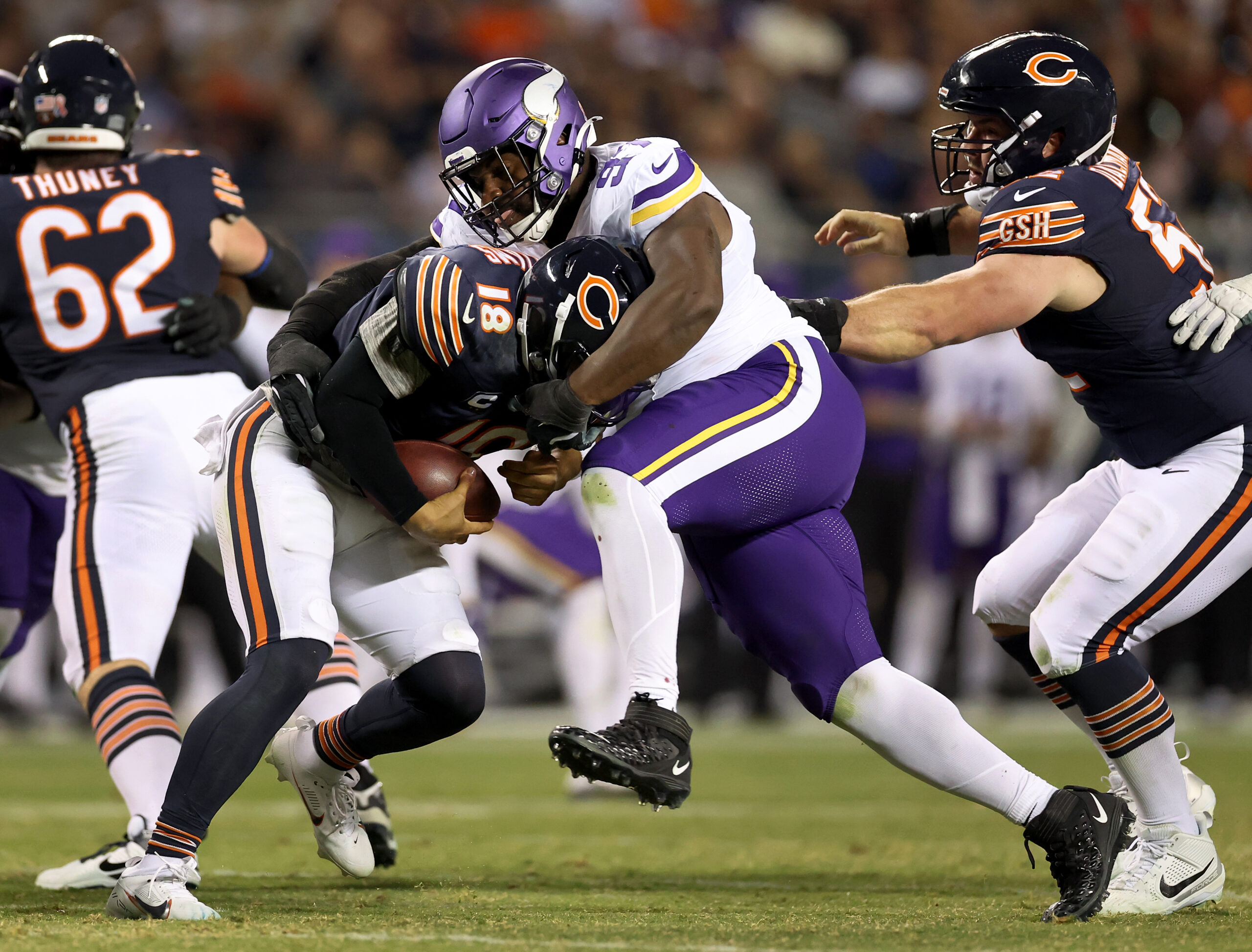 Minnesota Vikings defensive lineman Javon Hargrave sacks Chicago Bears quarterback...