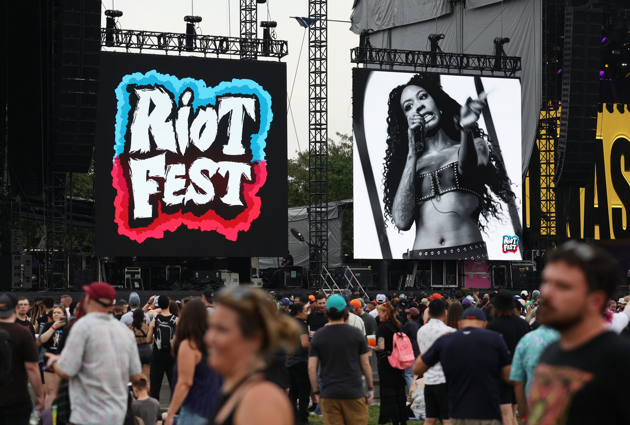 An image of Rico Nasty is cast on the big...