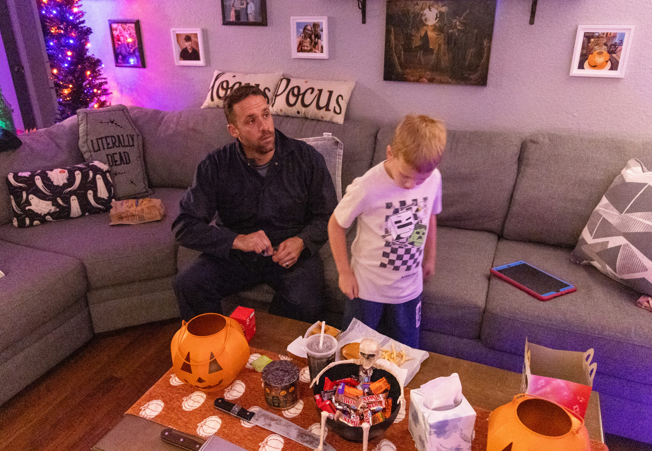 Evan Zimmerman, left, prepares a Happy Meal for his son...