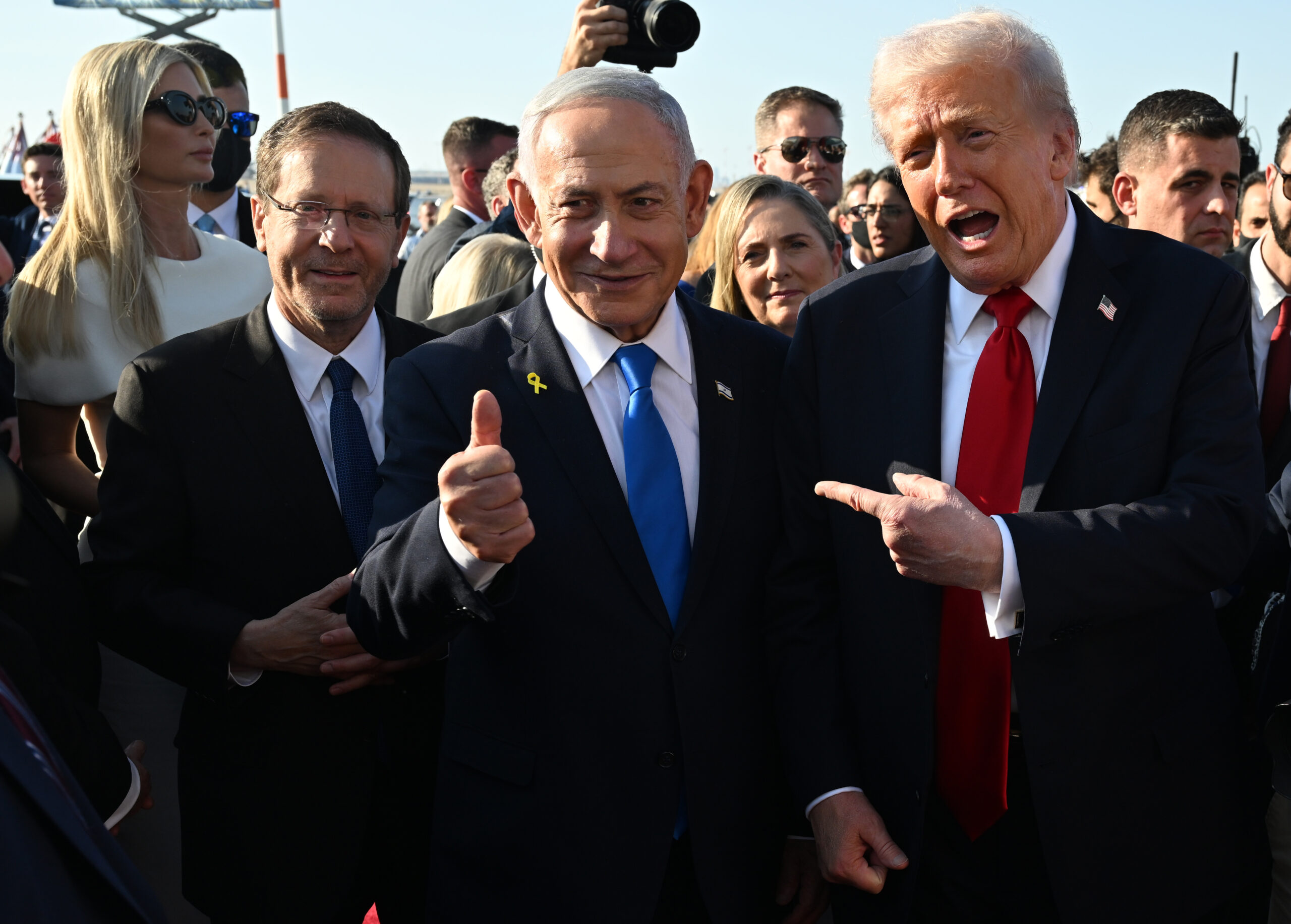 U.S. President Donald Trump poses with Israeli President Isaac Herzog...