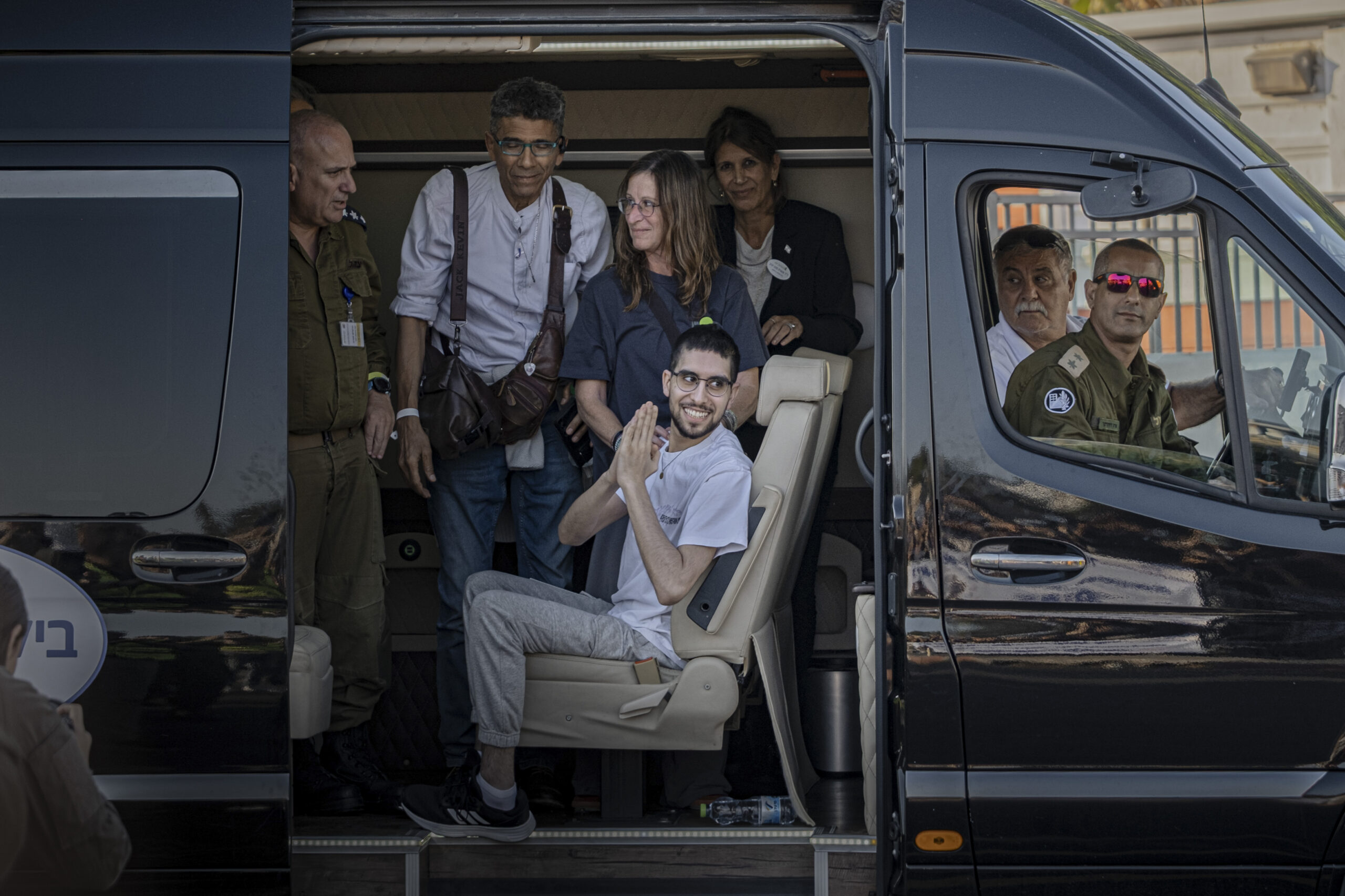 Evyatar David, center, a hostage released from the Gaza Strip,...