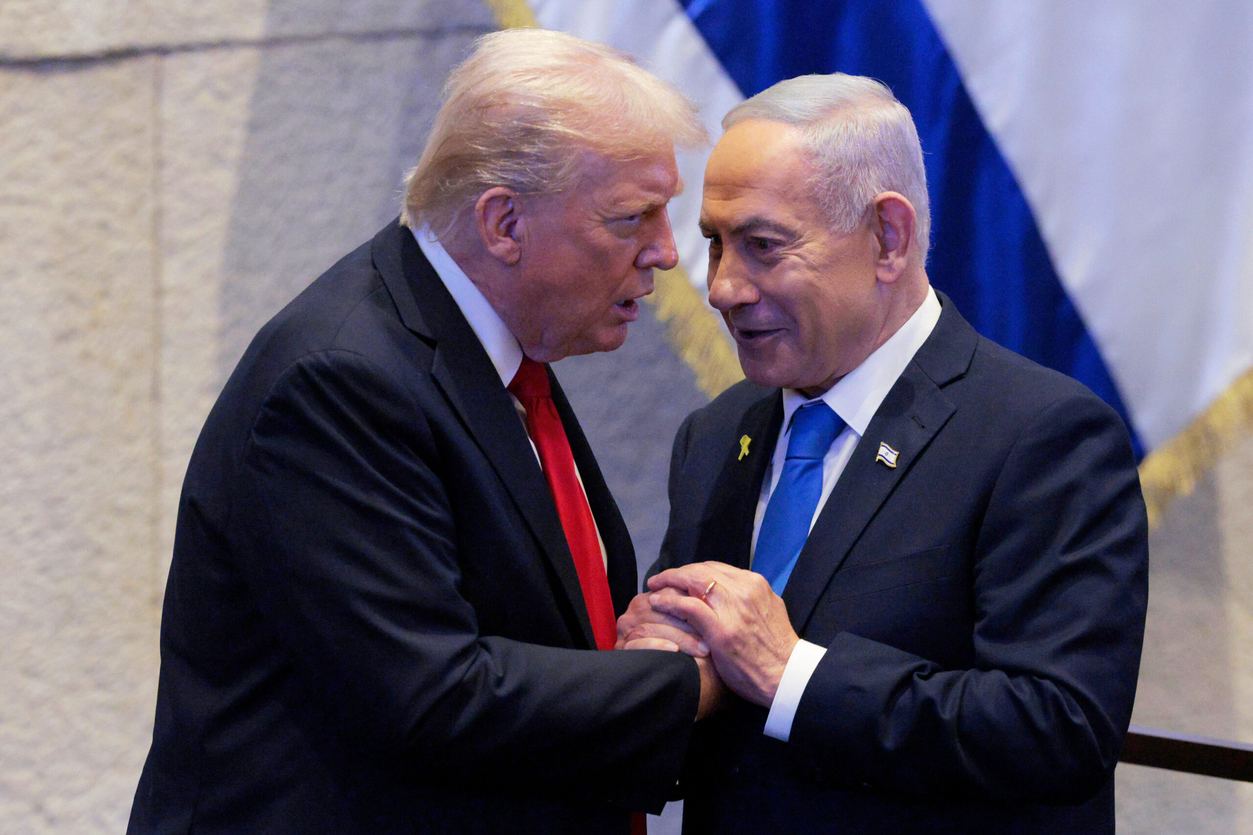 President Donald Trump talks with Israel's Prime Minister Benjamin Netanyahu...