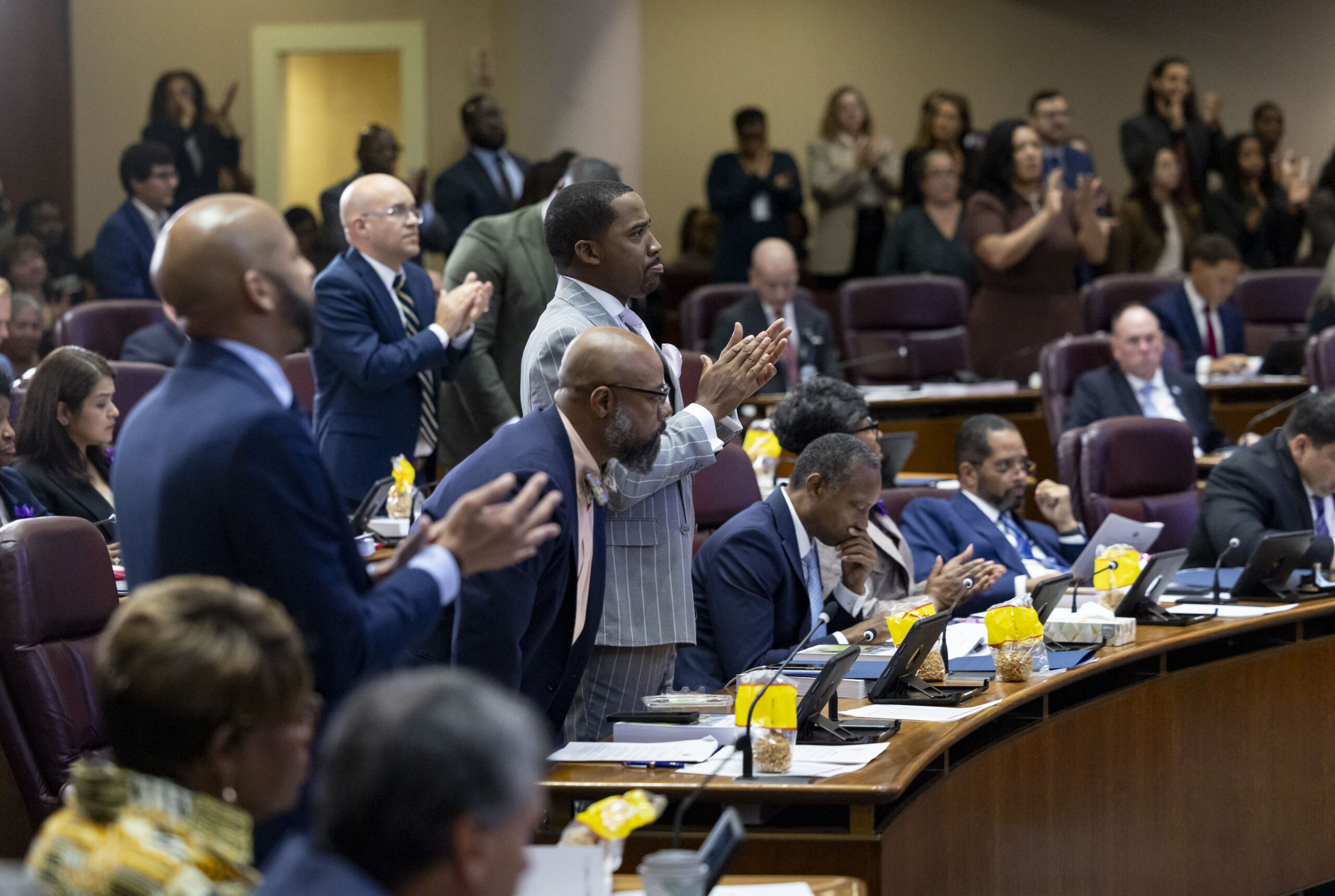 Some City Council members applaud while Mayor Brandon Johnson delivers...