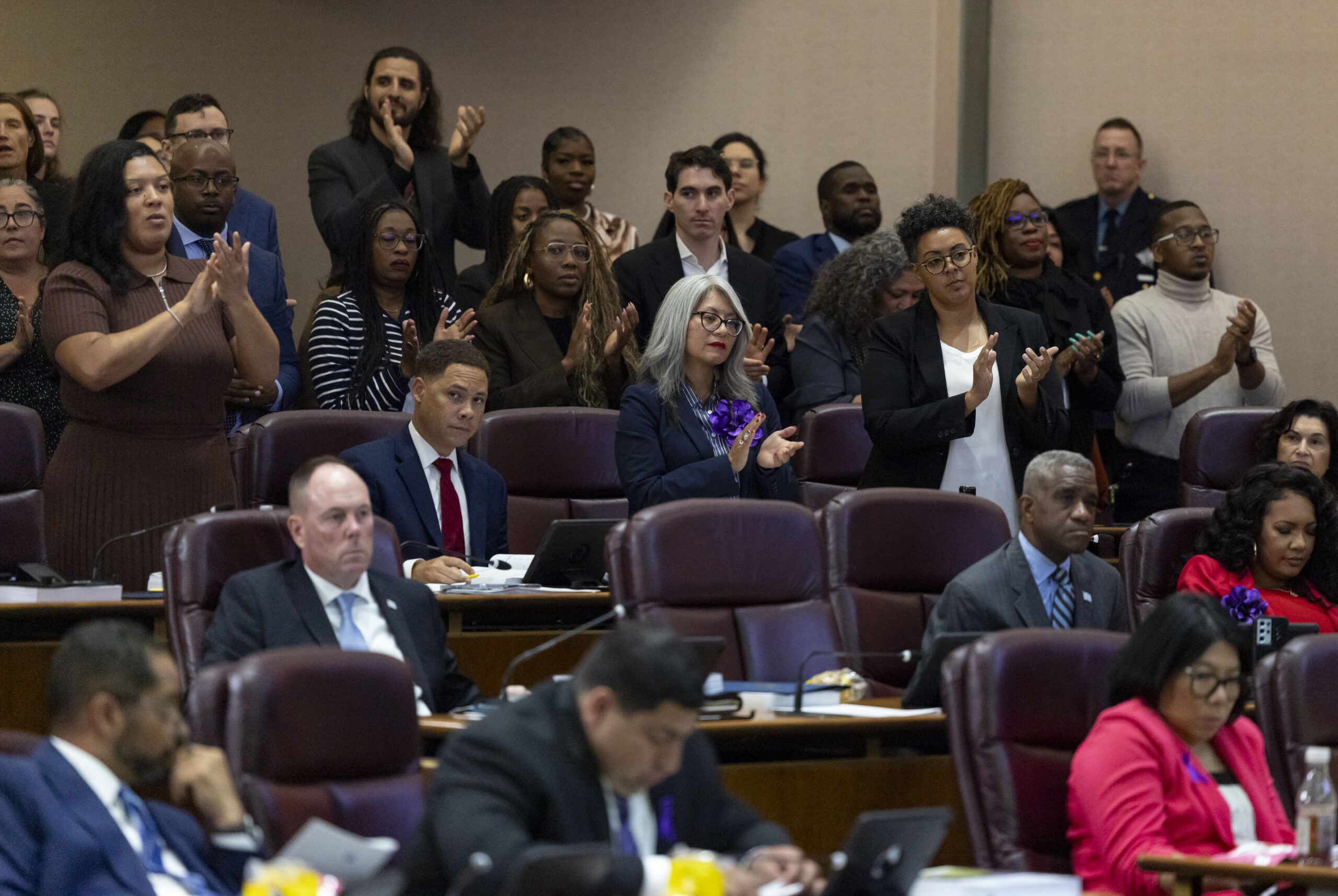 Some City Council members applaud as Chicago Mayor Brandon Johnson...