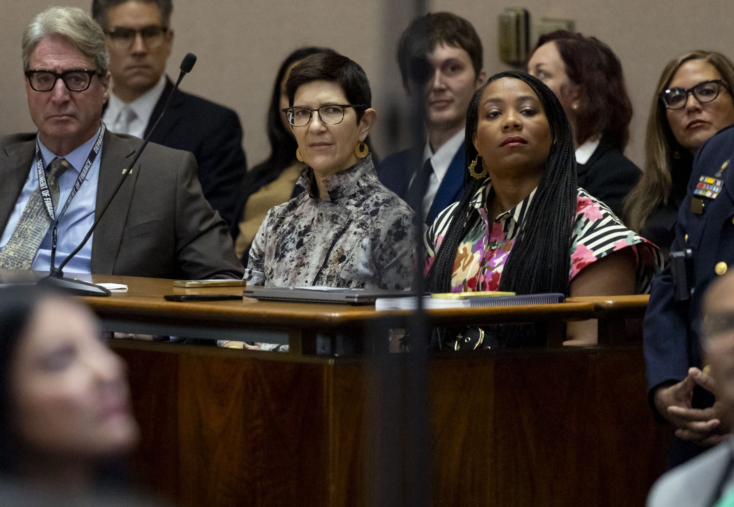 Chief Financial Officer Jill Jaworski, center, and budget director Annette...