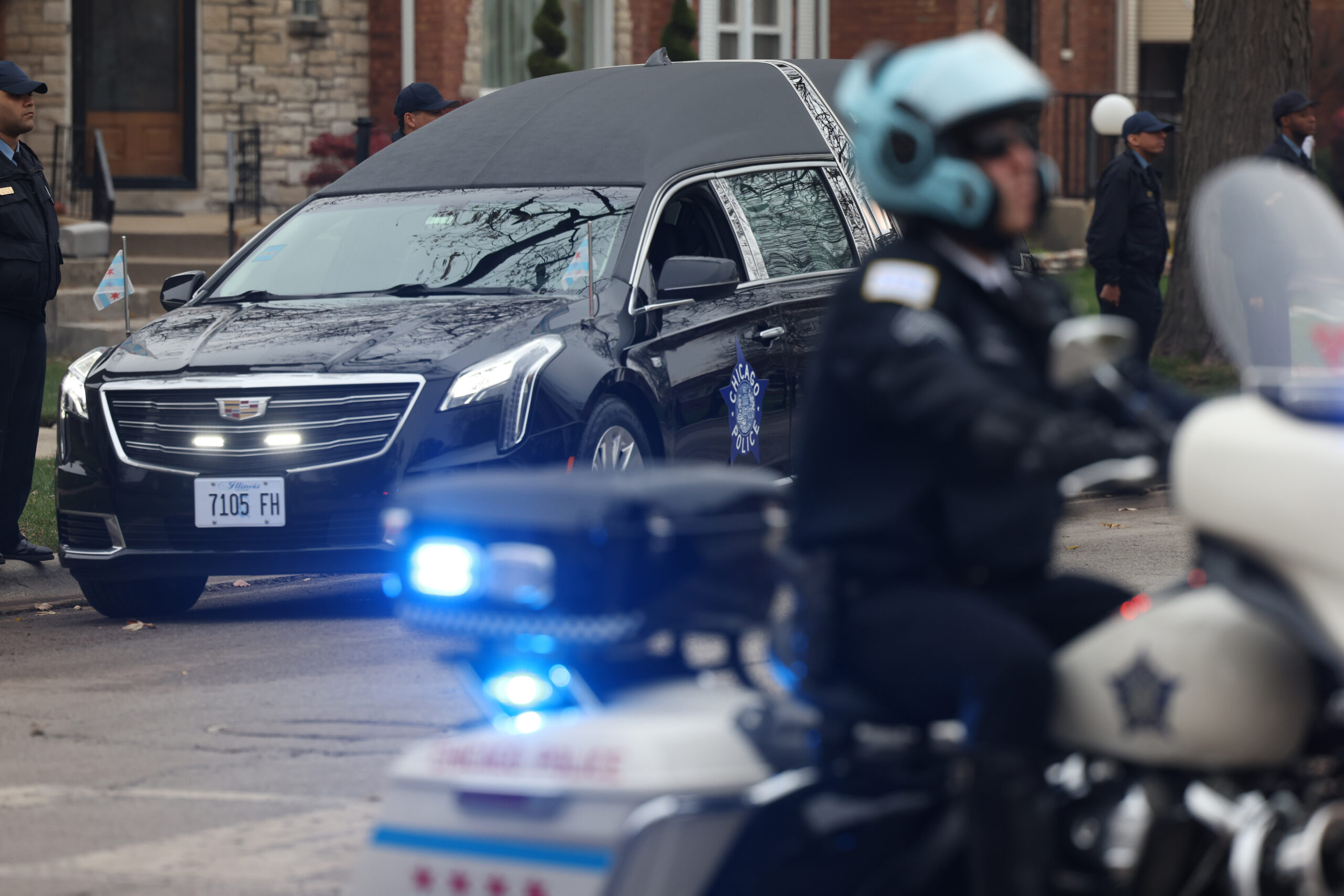 The funeral procession comes down Maplewood Avenue and 77th Street...