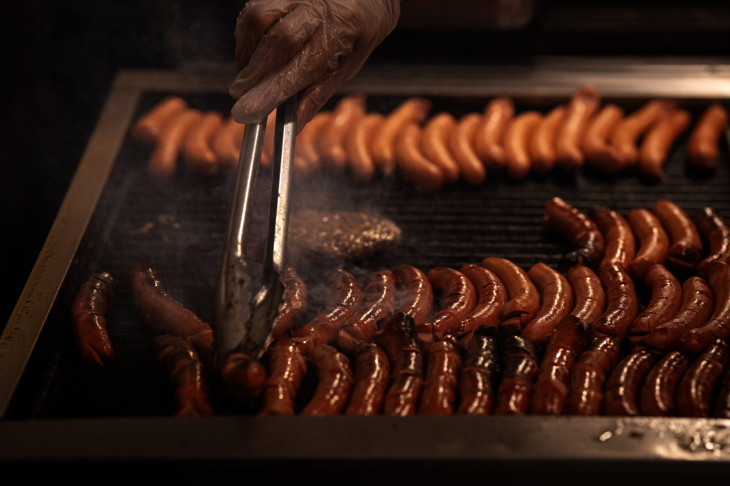 The grill at The Wieners Circle is full as the...