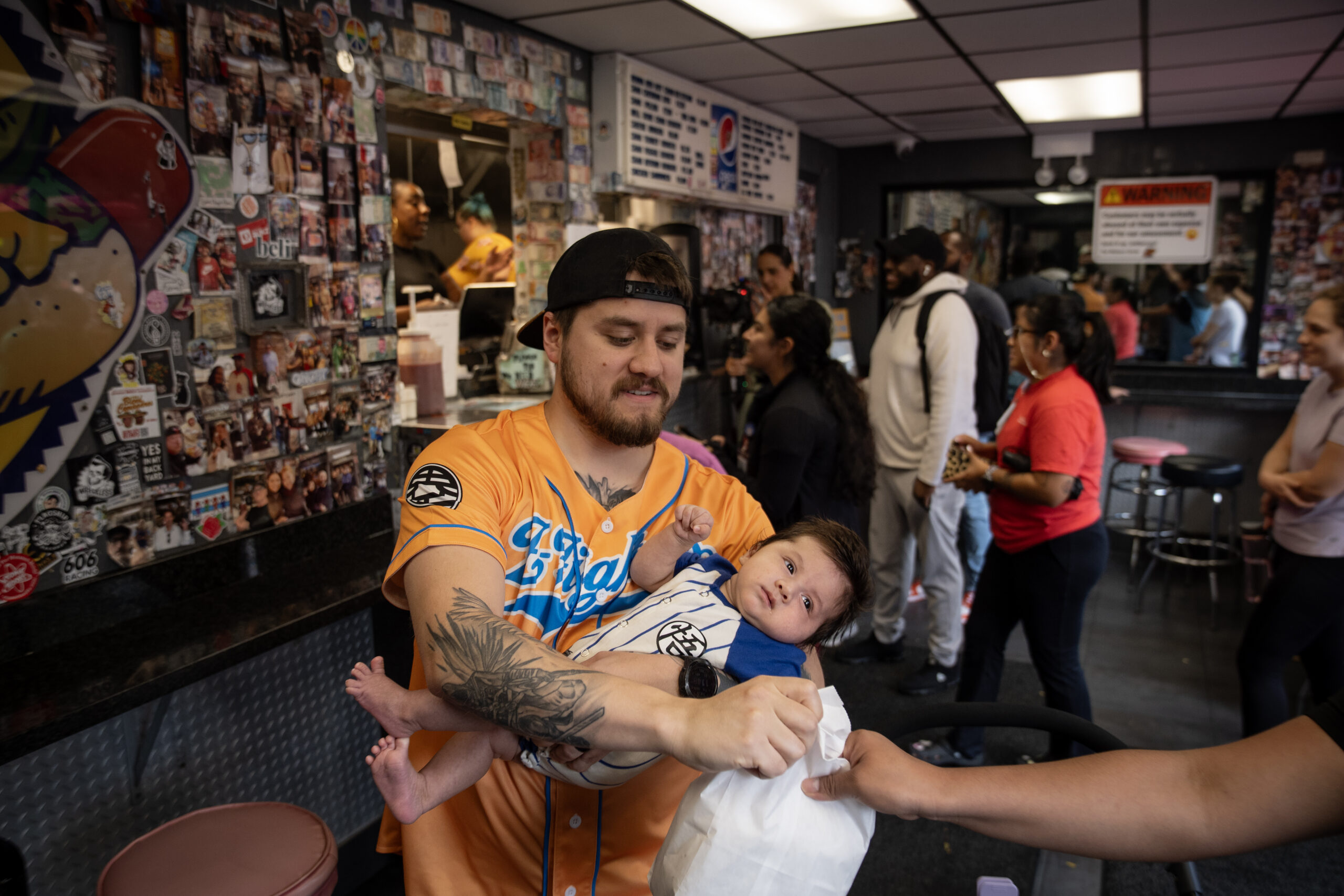 Joshua Zumarraga and his three month-old son, Joaquin, claim a...
