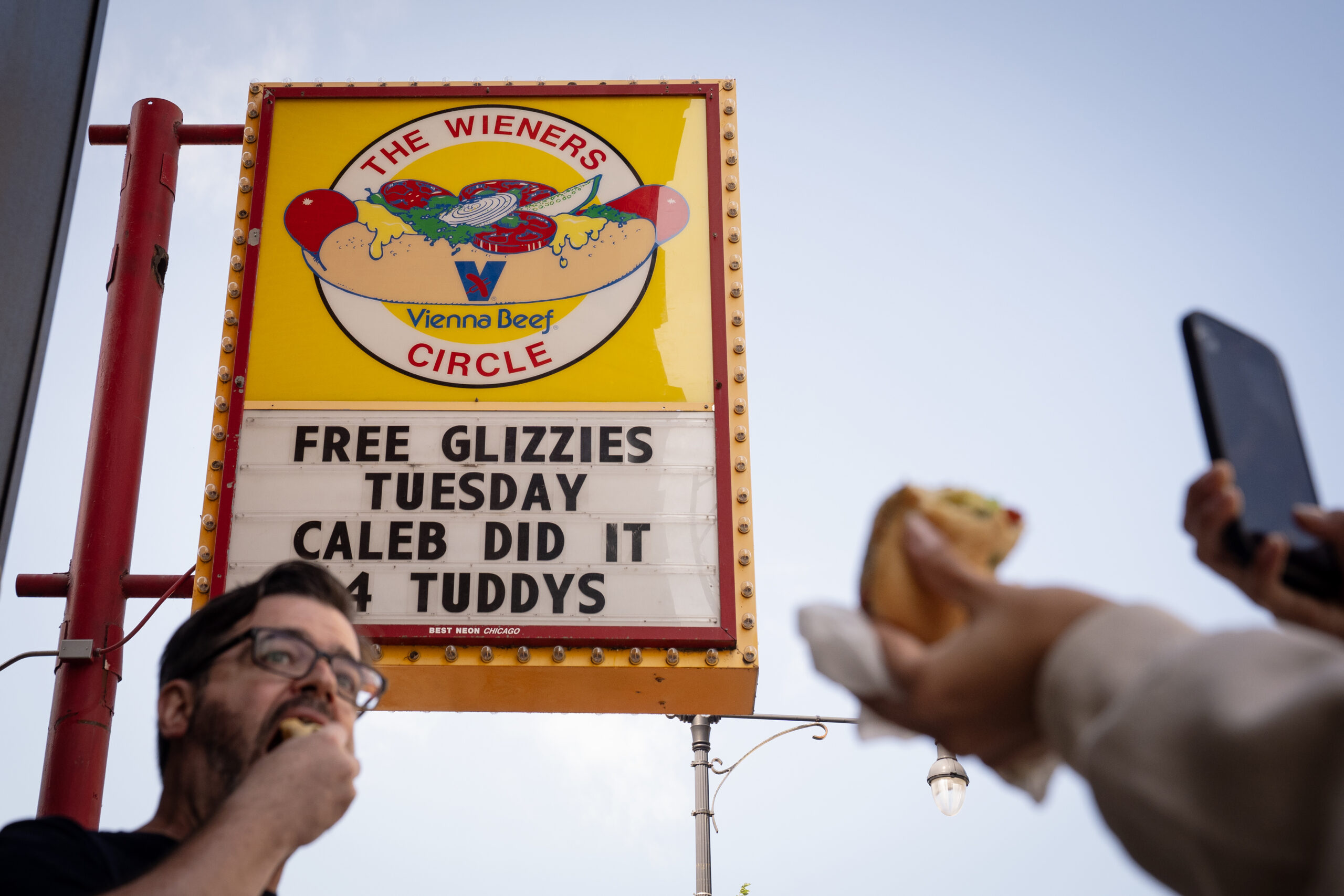 Bears fans and hot dog fans line up as The...