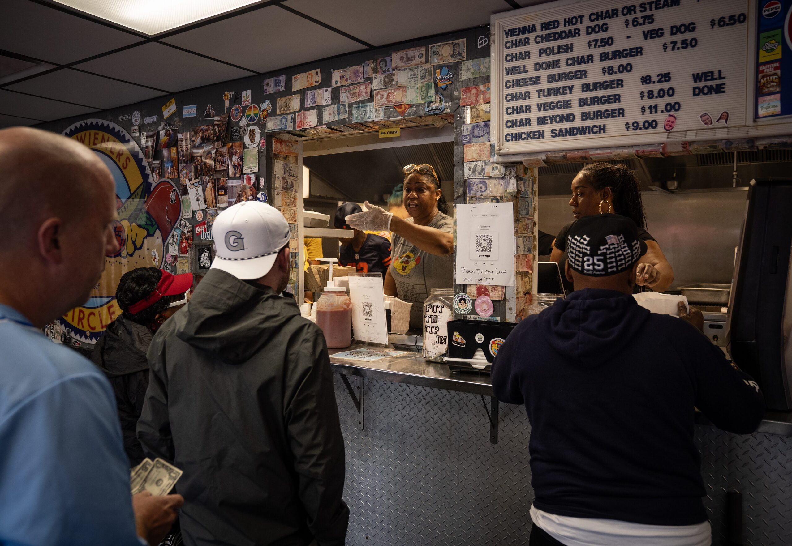 Evelyn Morris, left, and Toni Morris serve up free hot...