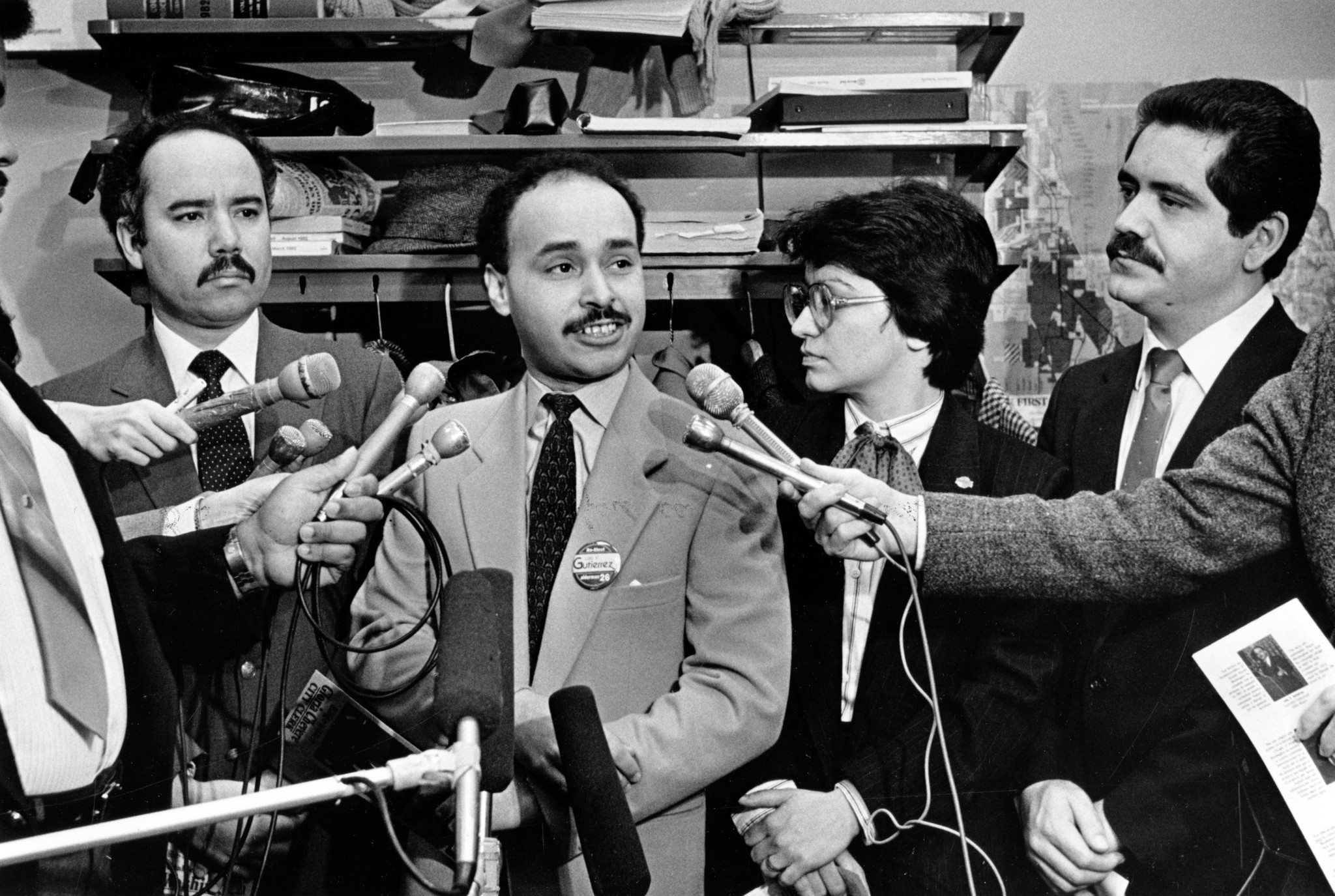 Ald. Luis Gutierrez, center, holds a press conference with State...