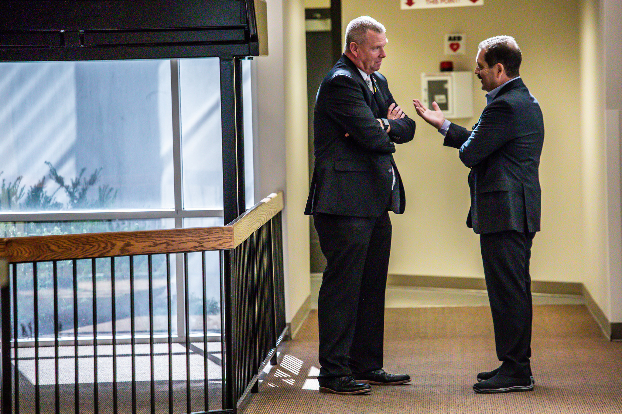 Kankakee County Sheriff Mike Downey, left, greets U.S. Rep. Jesus...