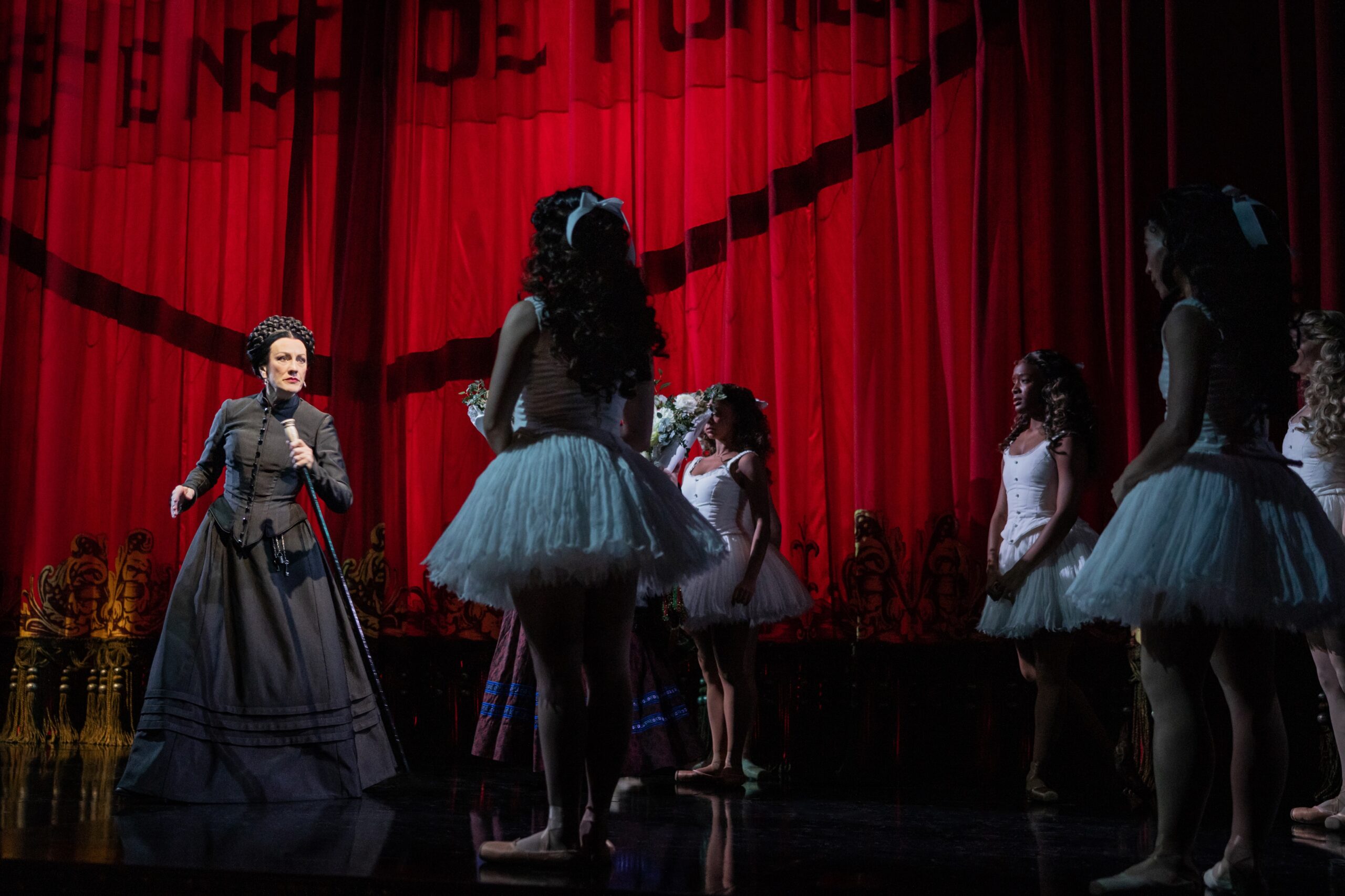 Lisa Vroman as Madame Giry and the Corps de Ballet...