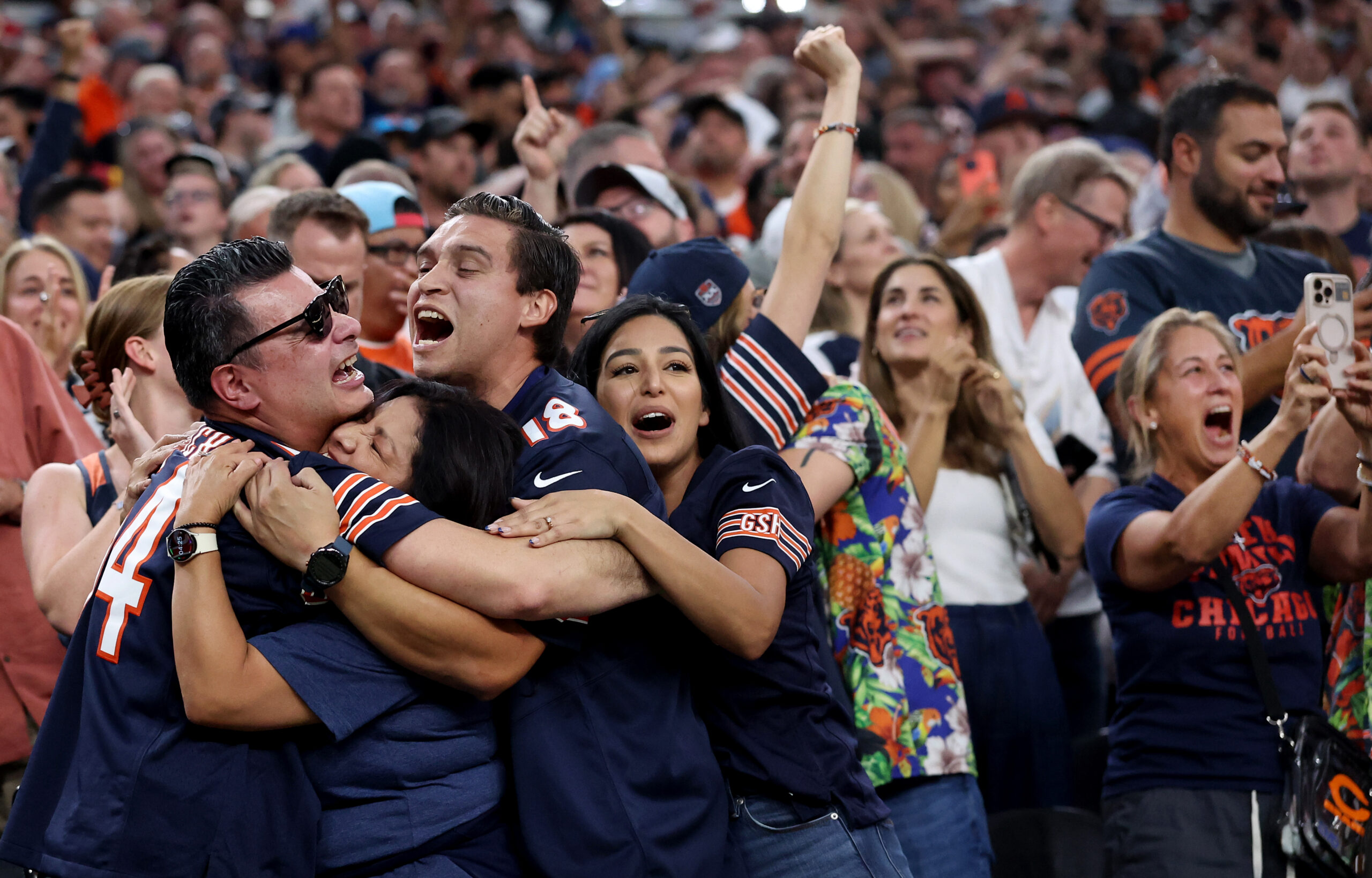 Sept. 28: Bears fans celebrate in the stands after a...