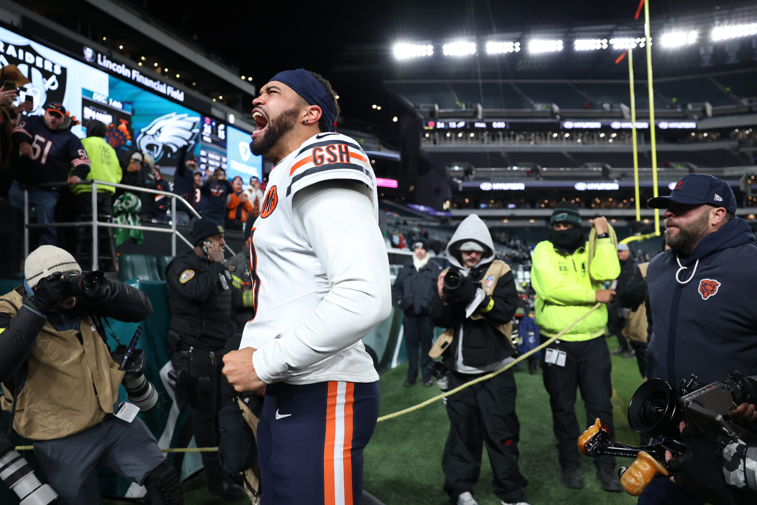 Chicago Bears quarterback Caleb Williams (18) celebrates after a victory...