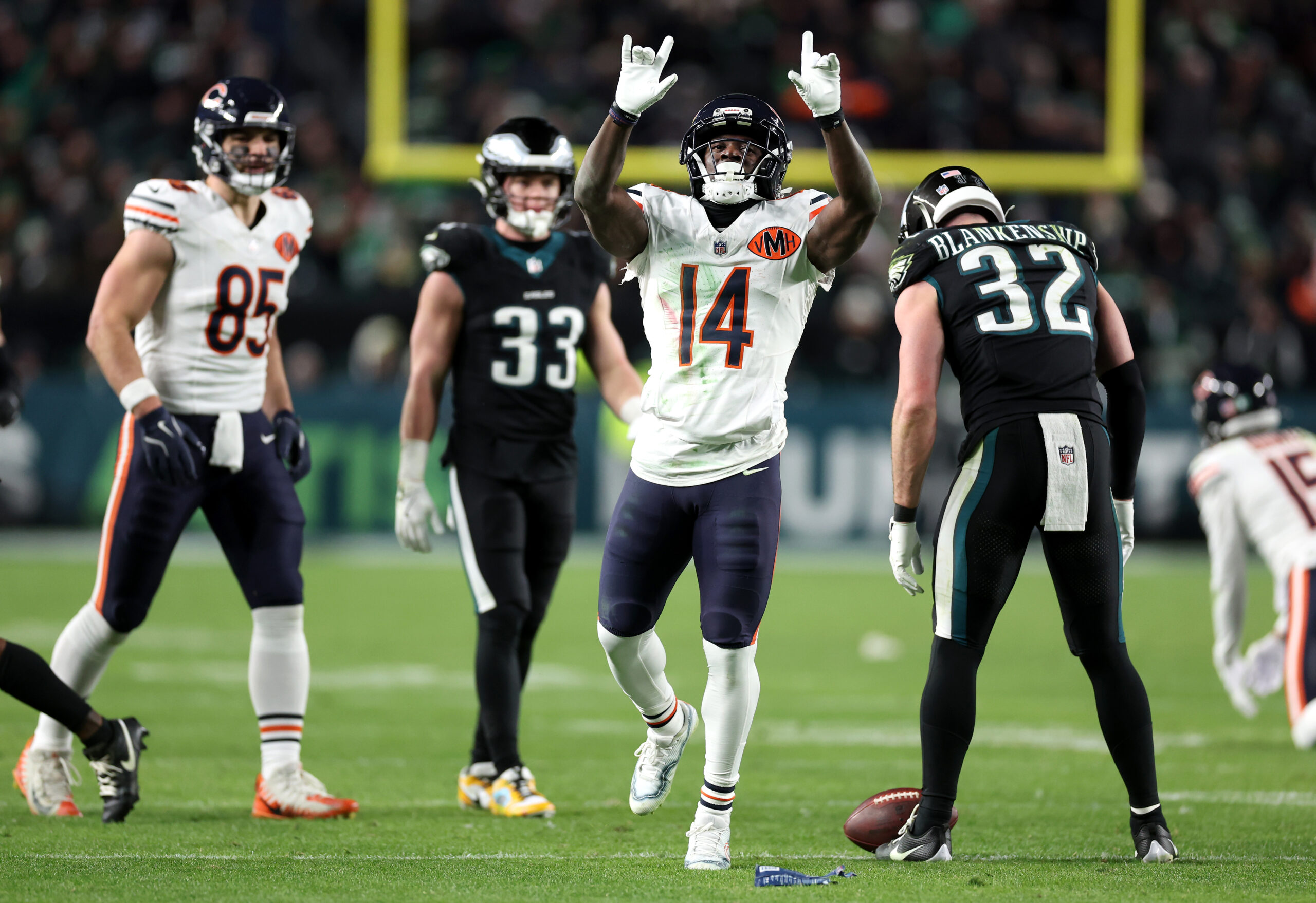 Chicago Bears wide receiver Olamide Zaccheaus (14) celebrates a catch...