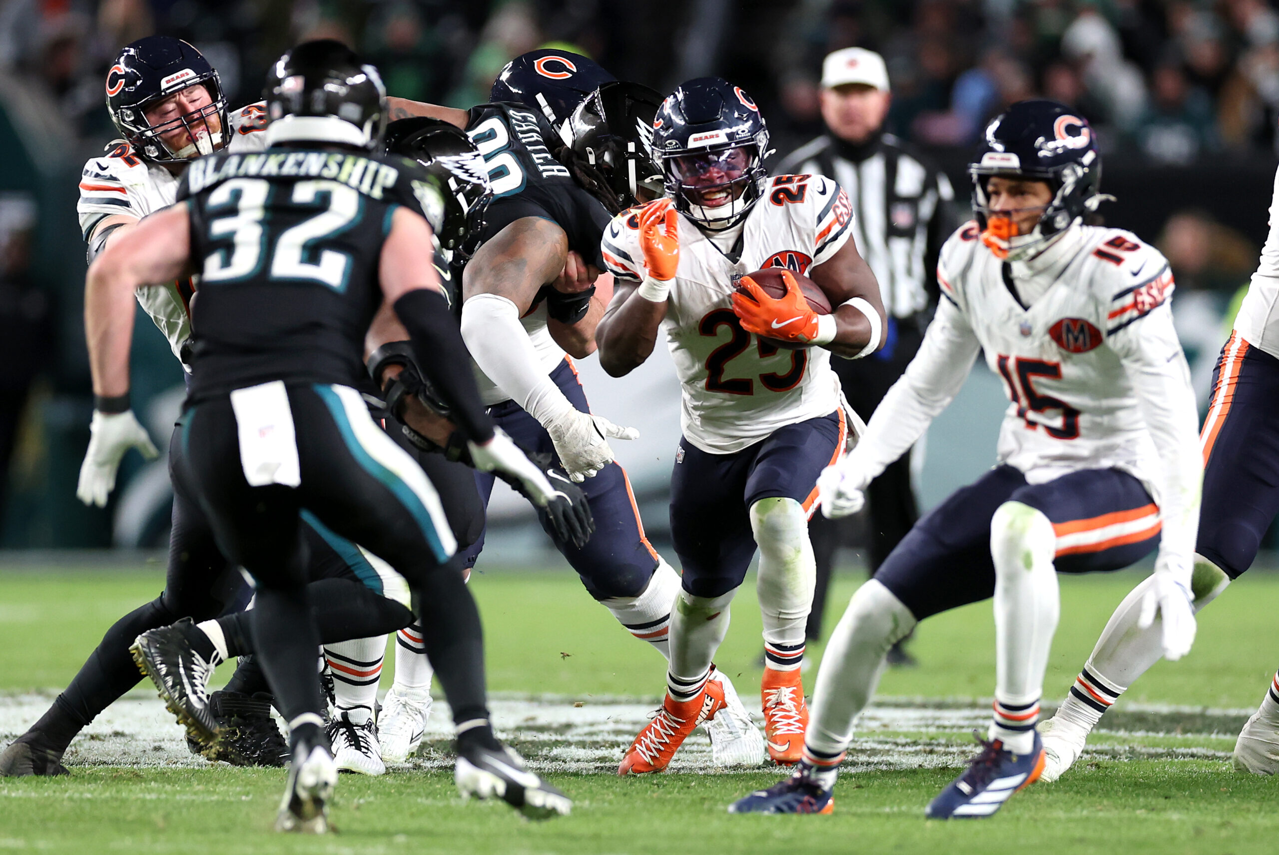 Bears running back Kyle Monangai finds a hole in the...