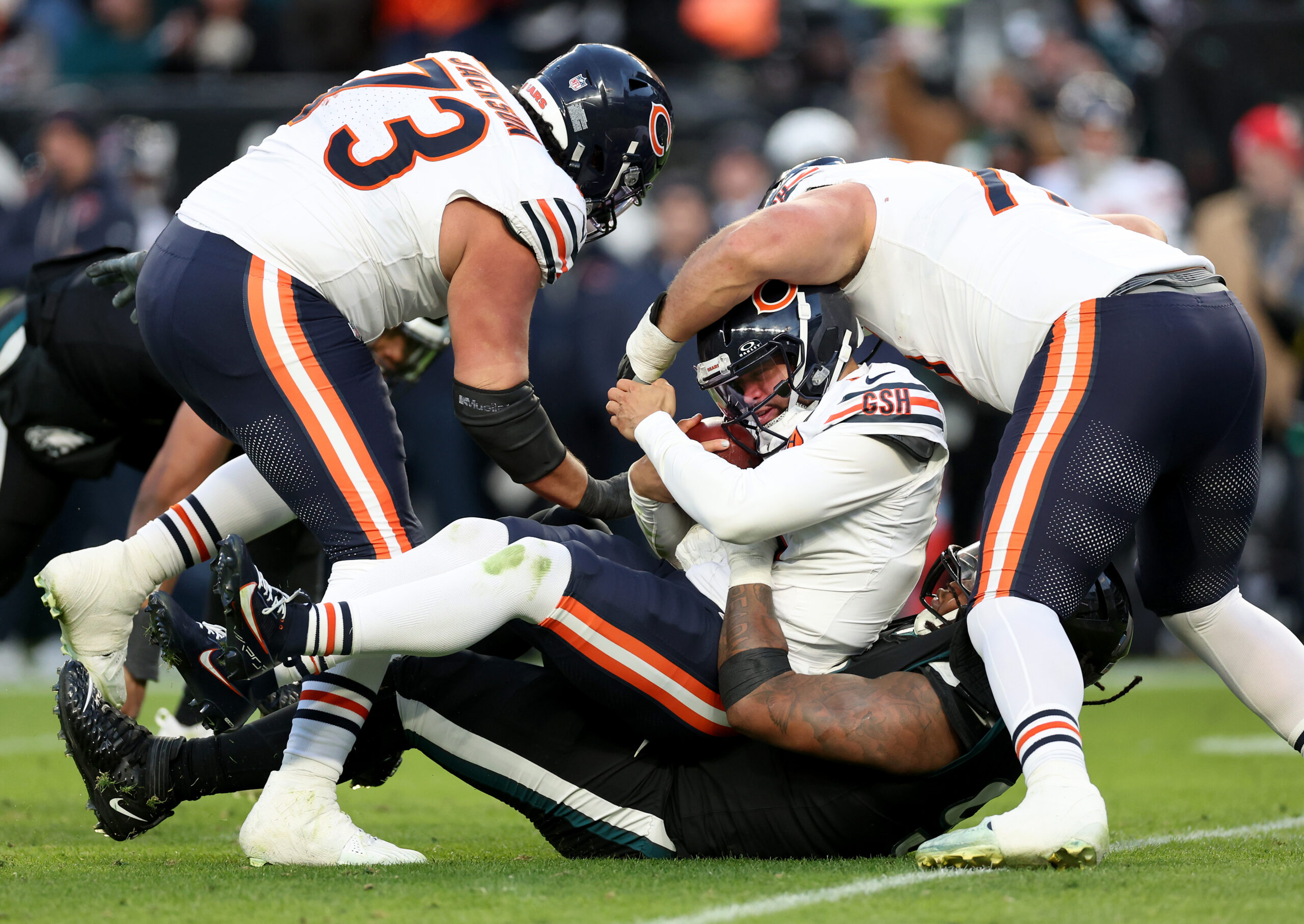 Chicago Bears quarterback Caleb Williams (18) is sacked by Philadelphia...