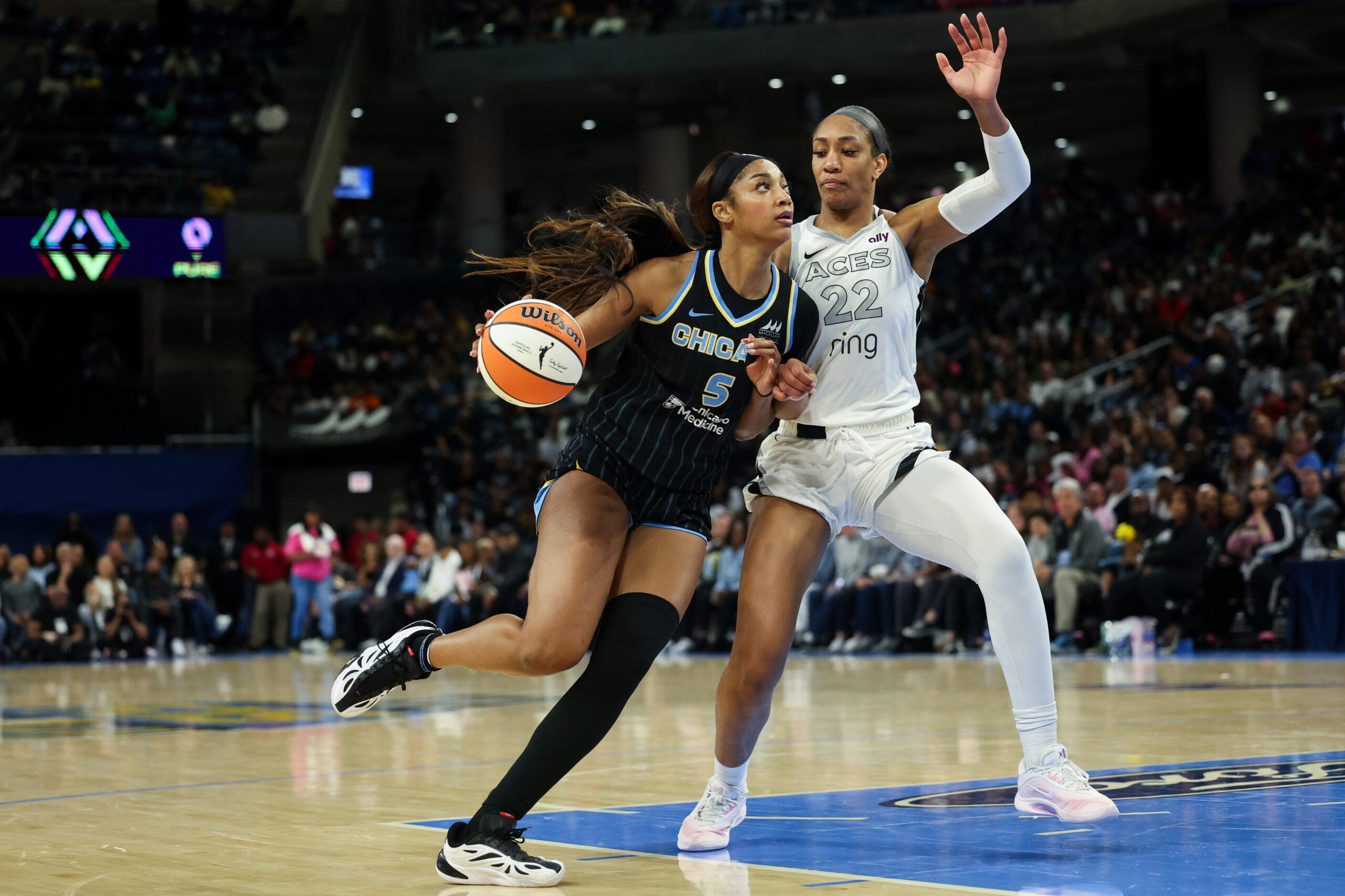 Las Vegas Aces center A'ja Wilson (22) guards Chicago Sky...