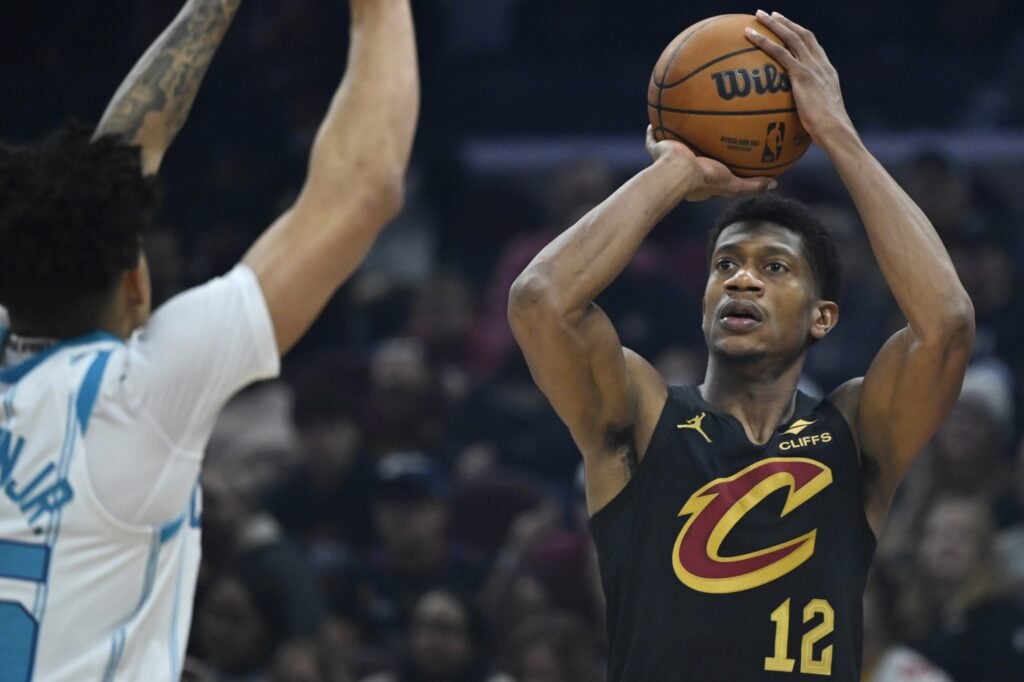 Dec 14, 2025; Cleveland, Ohio, USA; Cleveland Cavaliers forward De'Andre Hunter (12) shoots in the first quarter against the Charlotte Hornets at Rocket Arena. Mandatory Credit: David Richard-Imagn Images