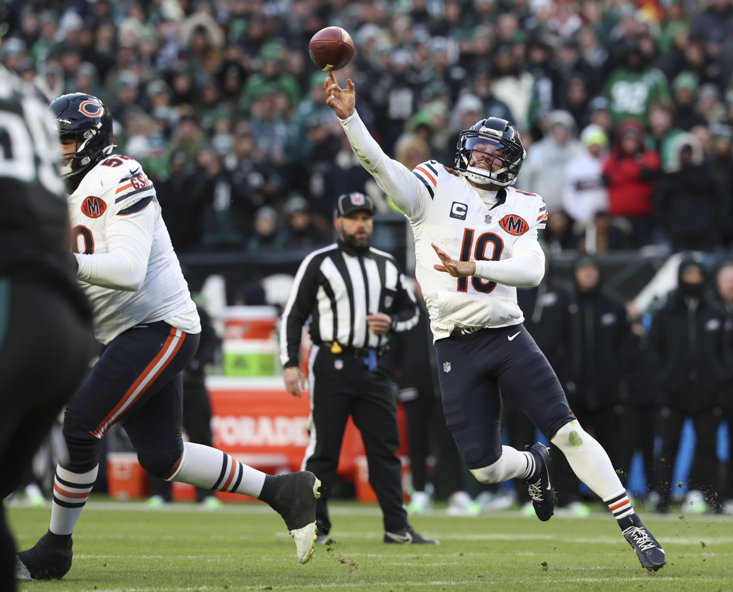 Chicago Bears quarterback Caleb Williams (18) throws a pass against...