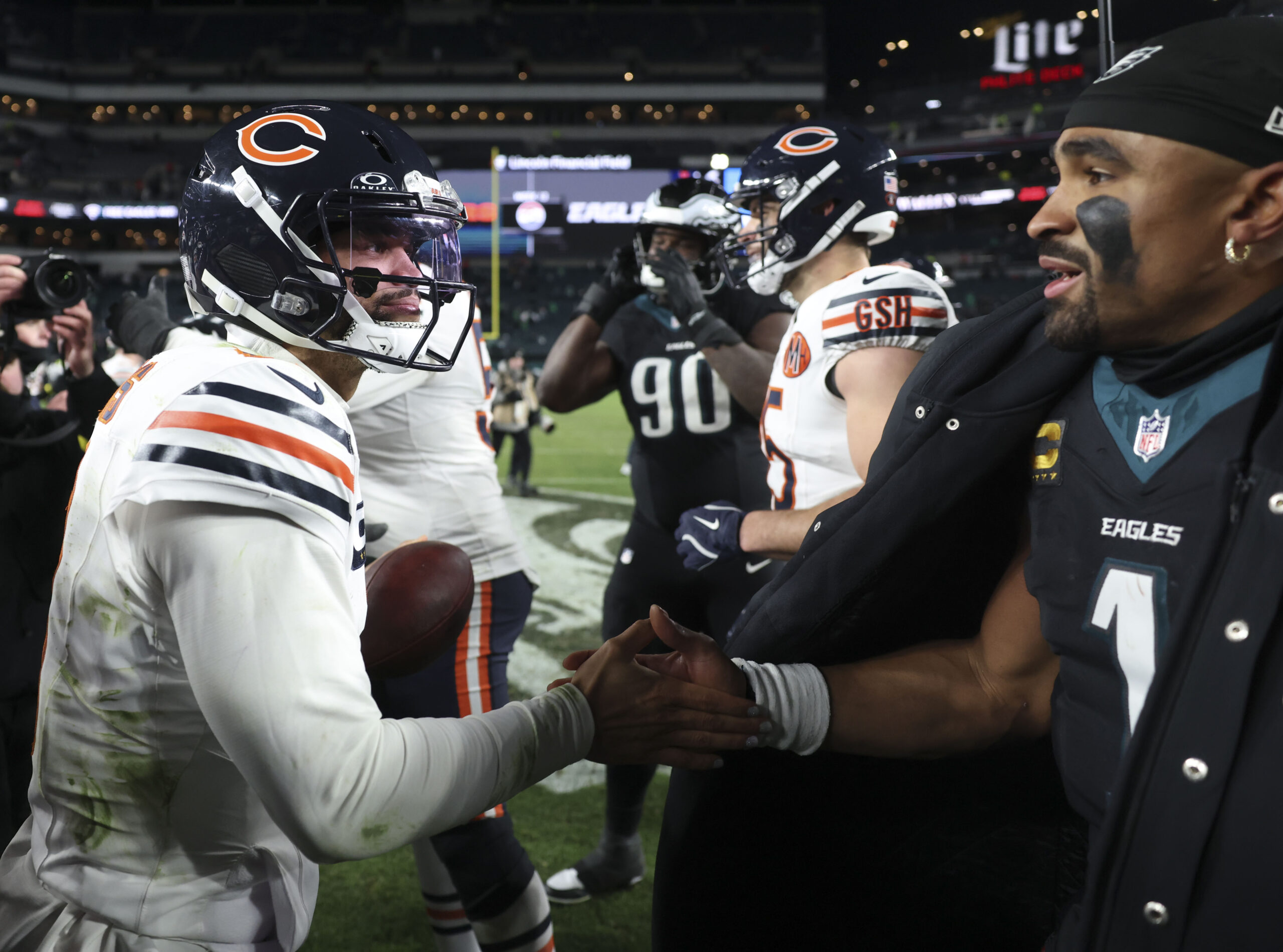 Bears quarterback Caleb Williams and Eagles quarterback Jalen Hurts meet...