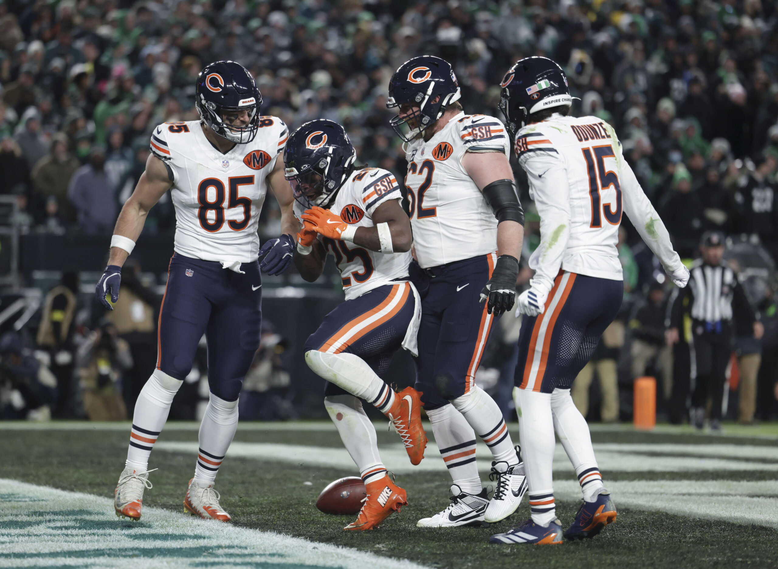 Chicago Bears running back Kyle Monangai celebrates his touchdown against...