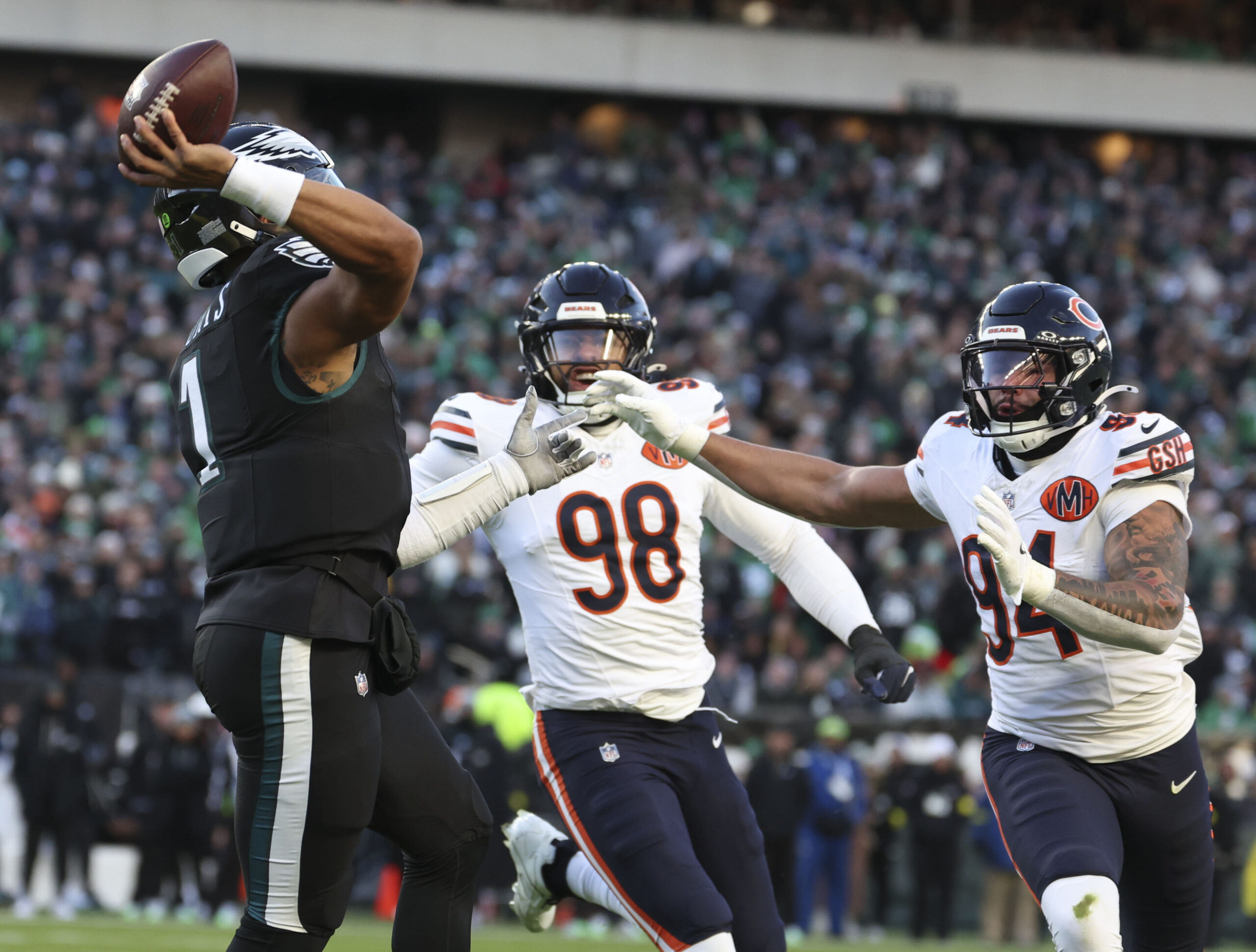 Chicago Bears defensive end Austin Booker (94) rushes Philadelphia Eagles...