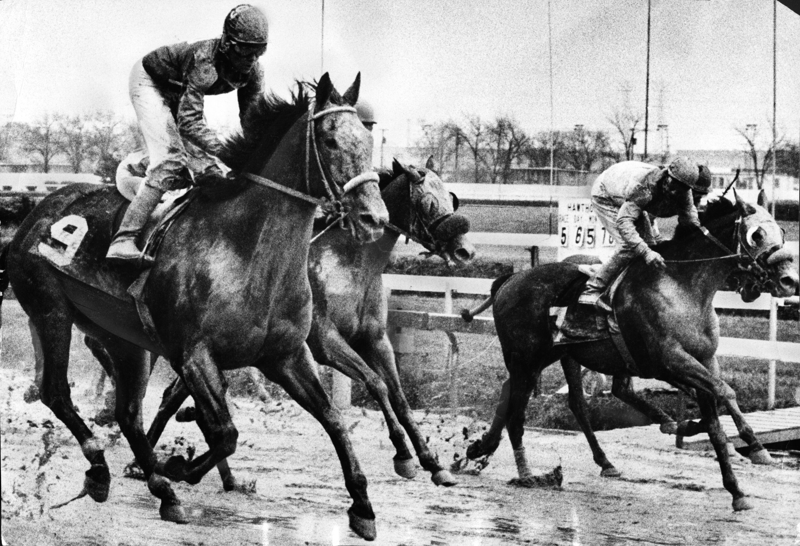 Maxwell G. (9) splashing across the finish line at Hawthorne...
