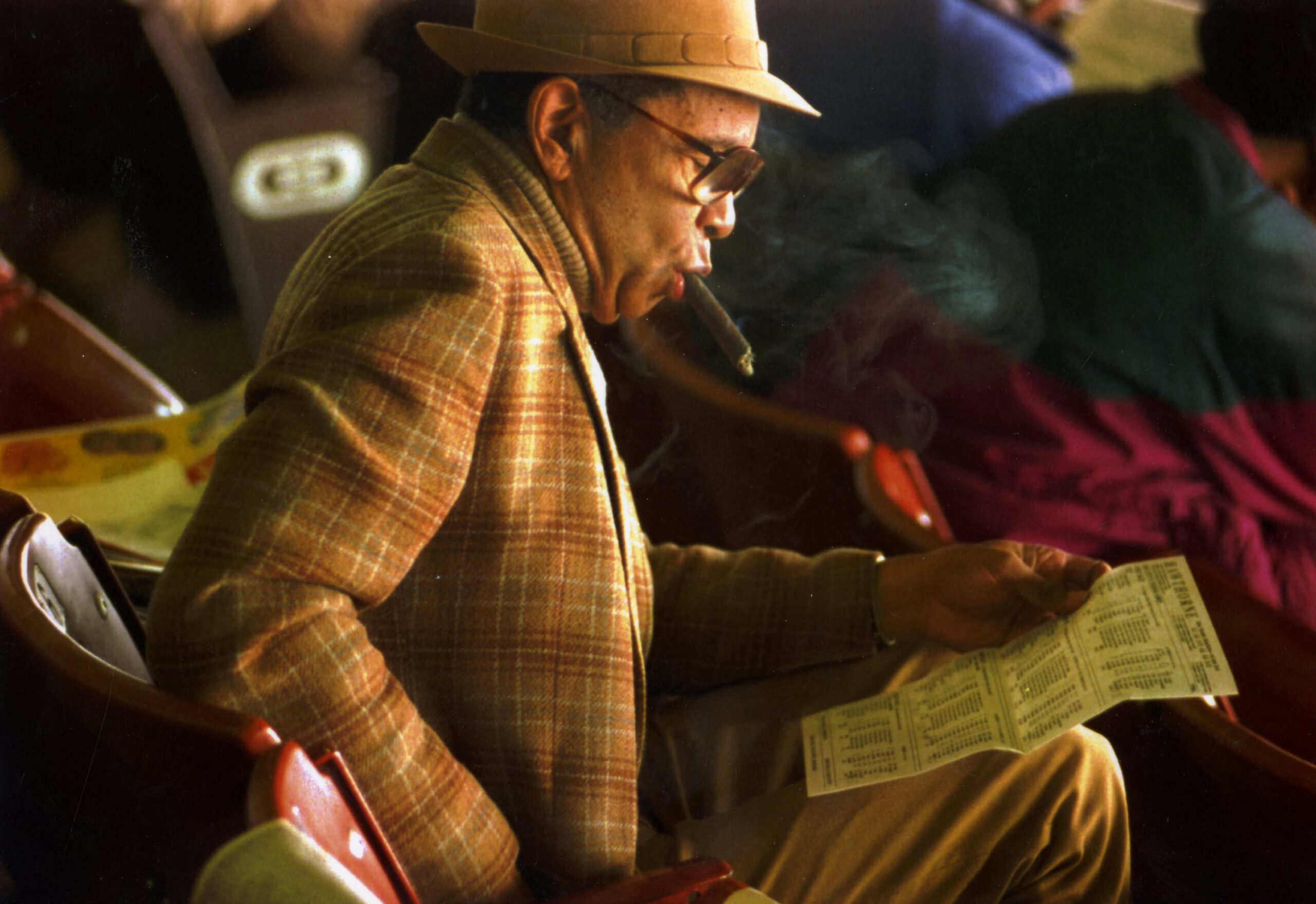 Henry Spillers checks out his racing form at Hawthorne Race...