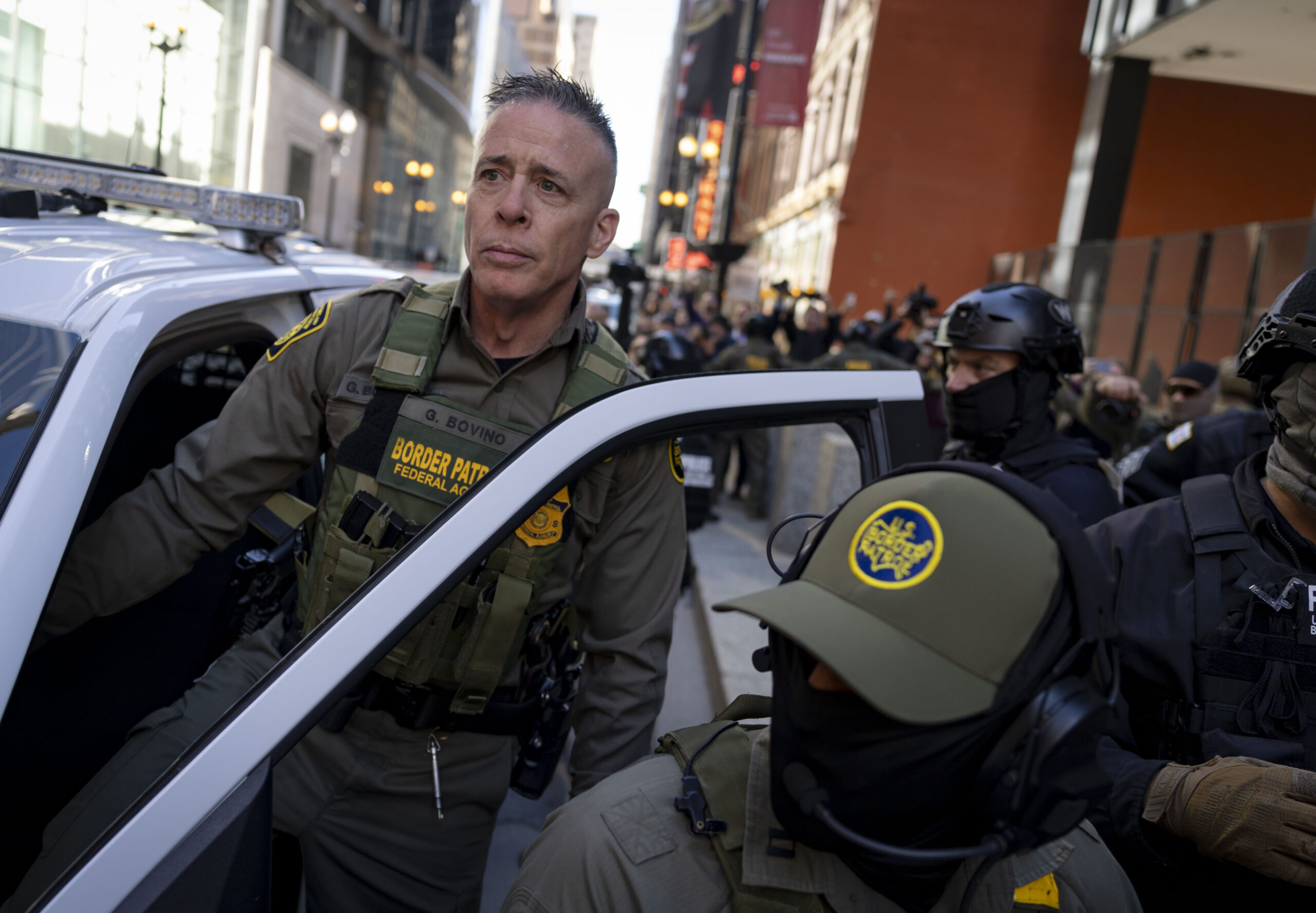 Border Patrol Cmdr. Gregory Bovino leaves the Dirksen U.S. Courthouse...